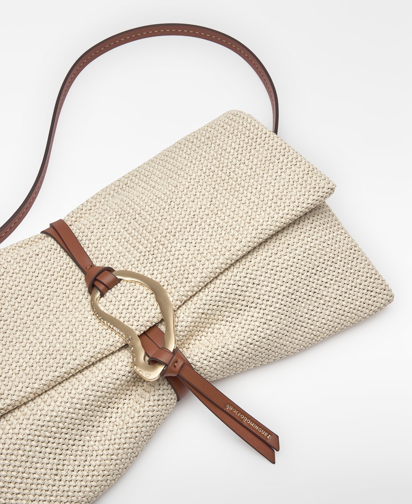 Raffia texture clutch with metal piece image number 2