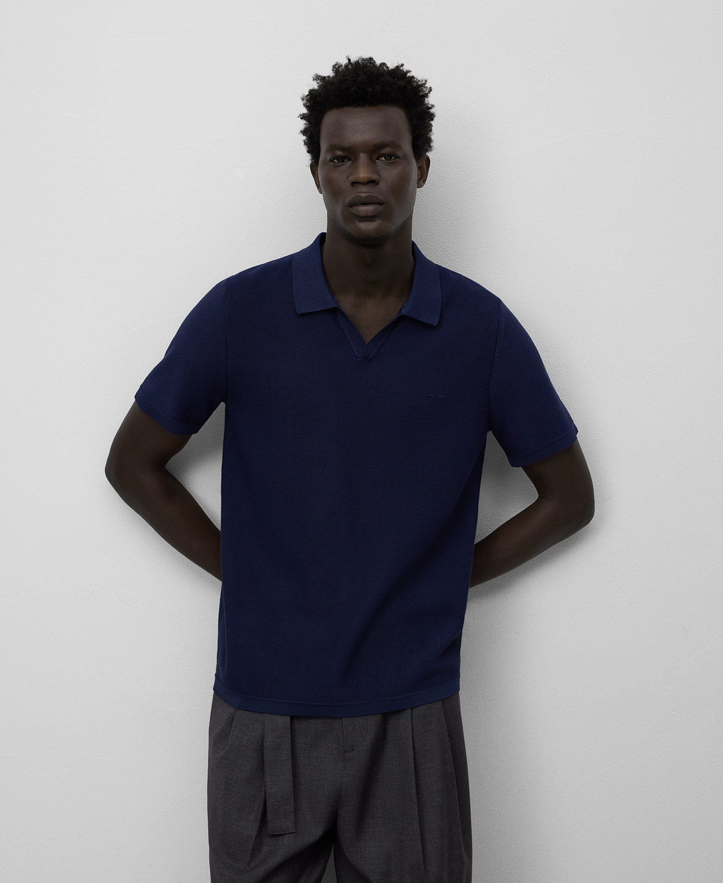 V-neck structured knit polo shirt man image number 0