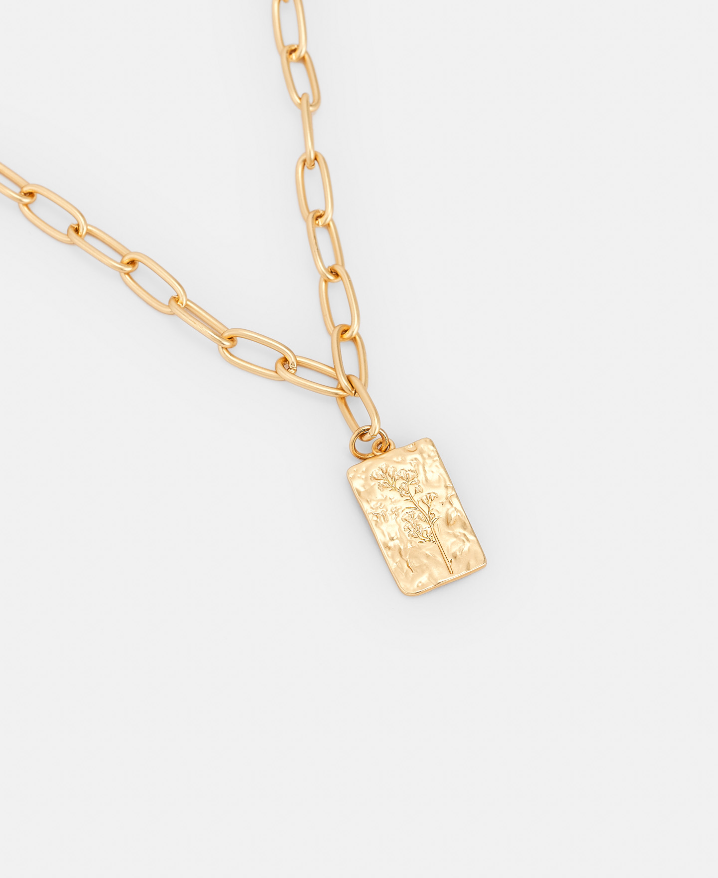 Metal pendant with pressed motif image number 1
