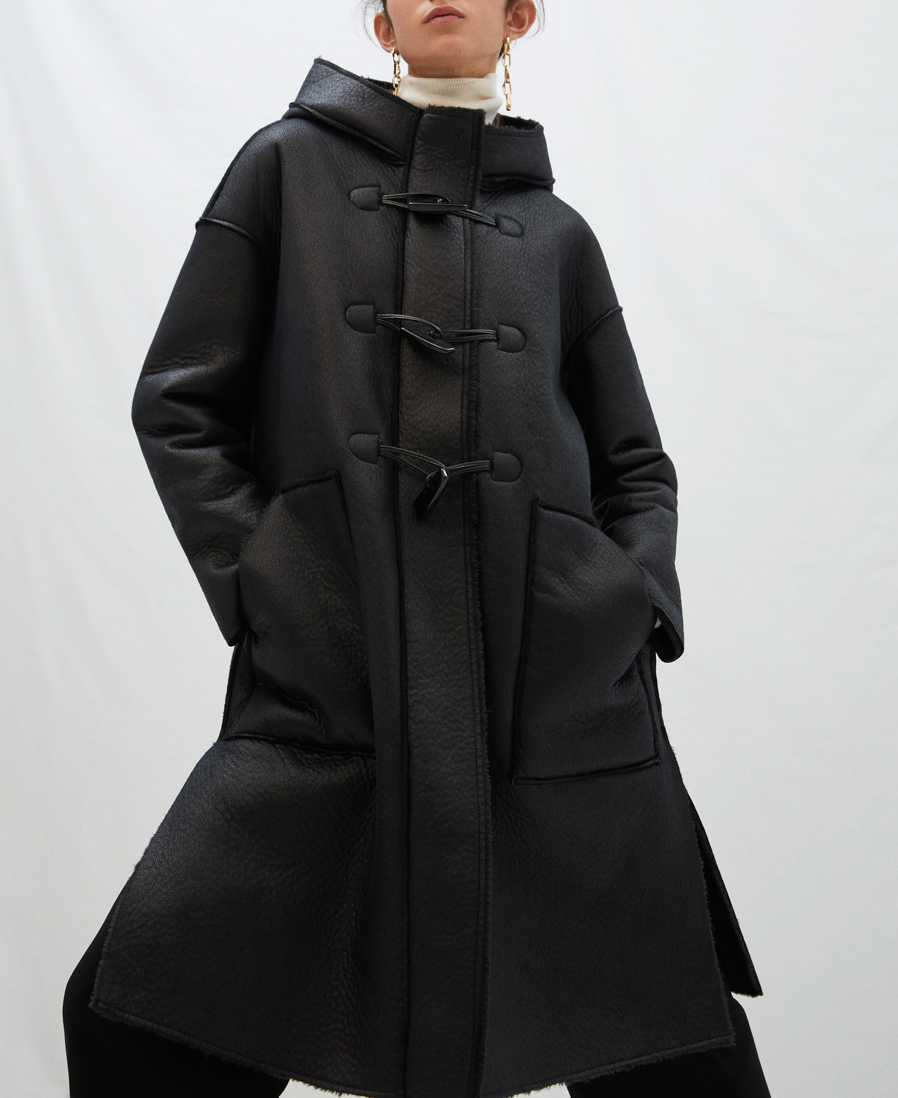 Parka con capucha en textura piel image number 0