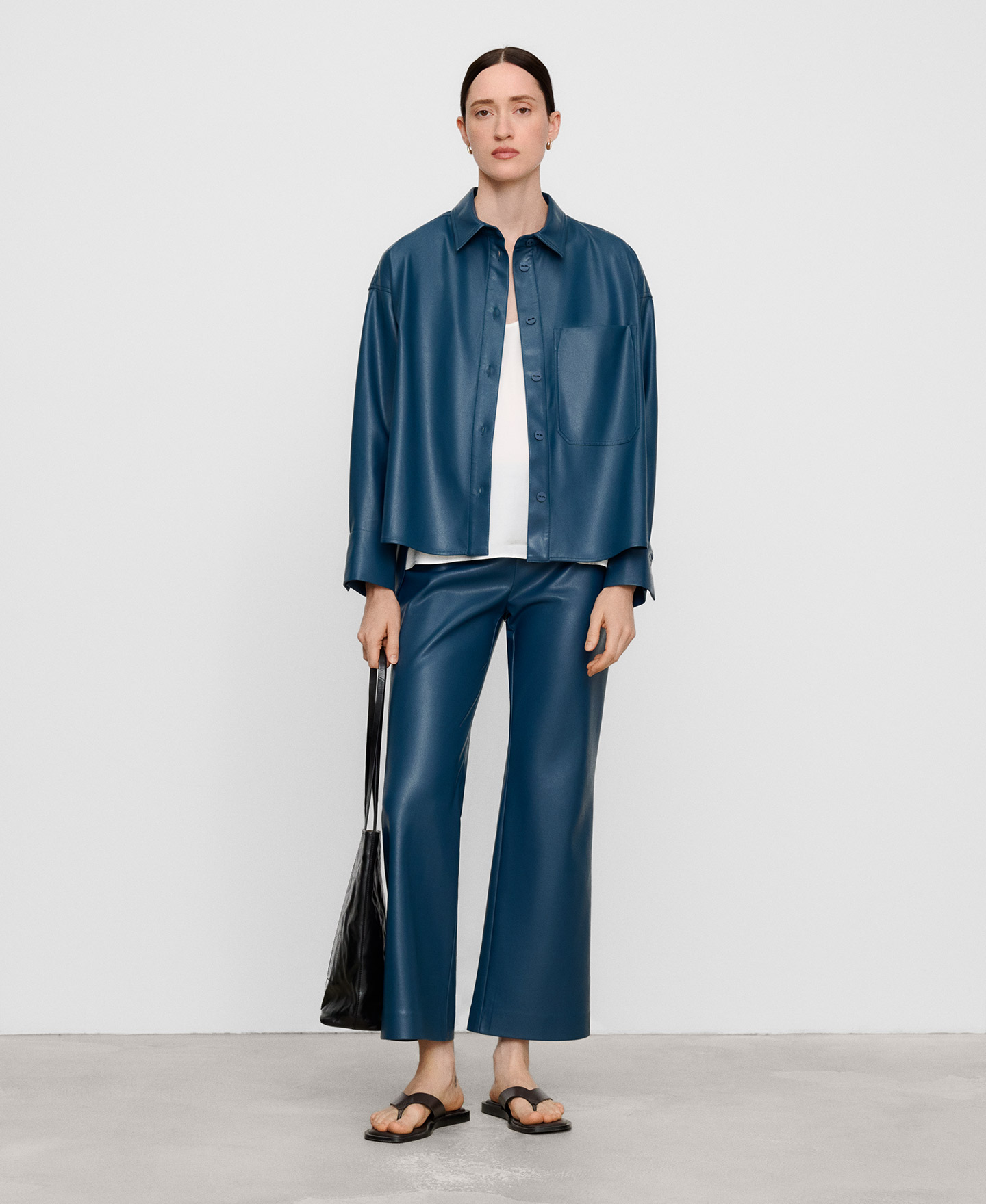 Leather-Non-Leather flare trousers image number 1