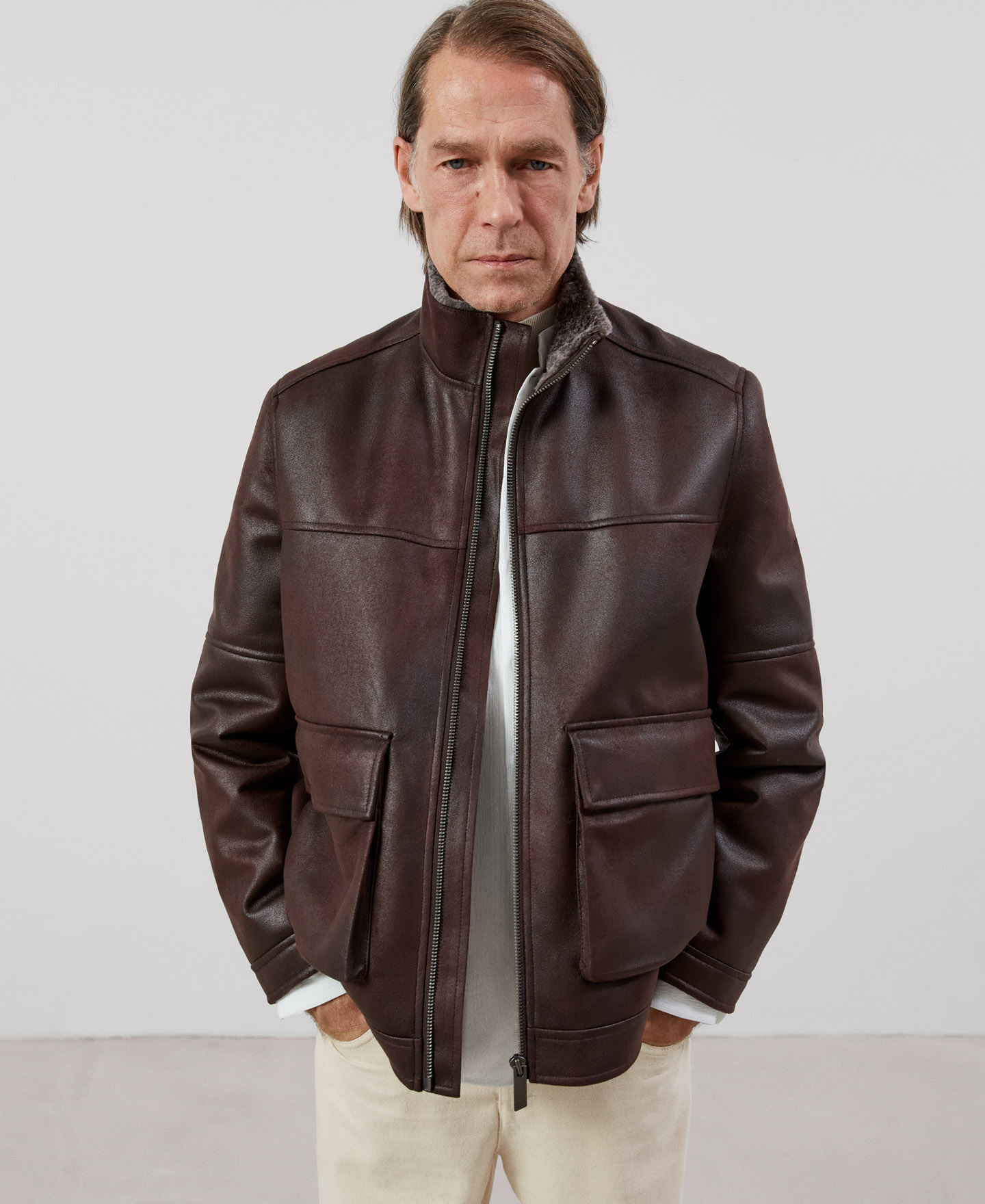 Leather texture funnel collar jacket image number 0