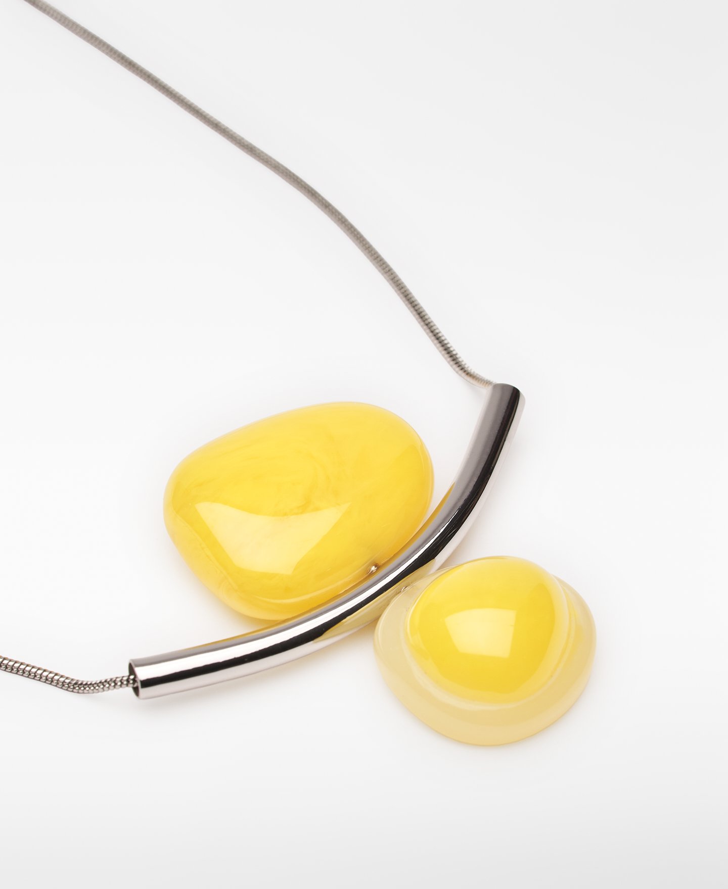 Metal necklace with two-tone resin piece image number 1