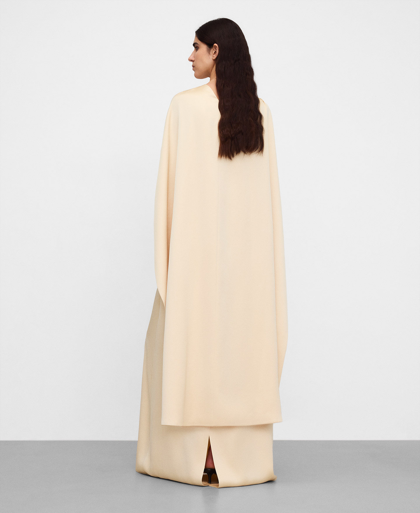 Long satin dress with a back cape image number 2
