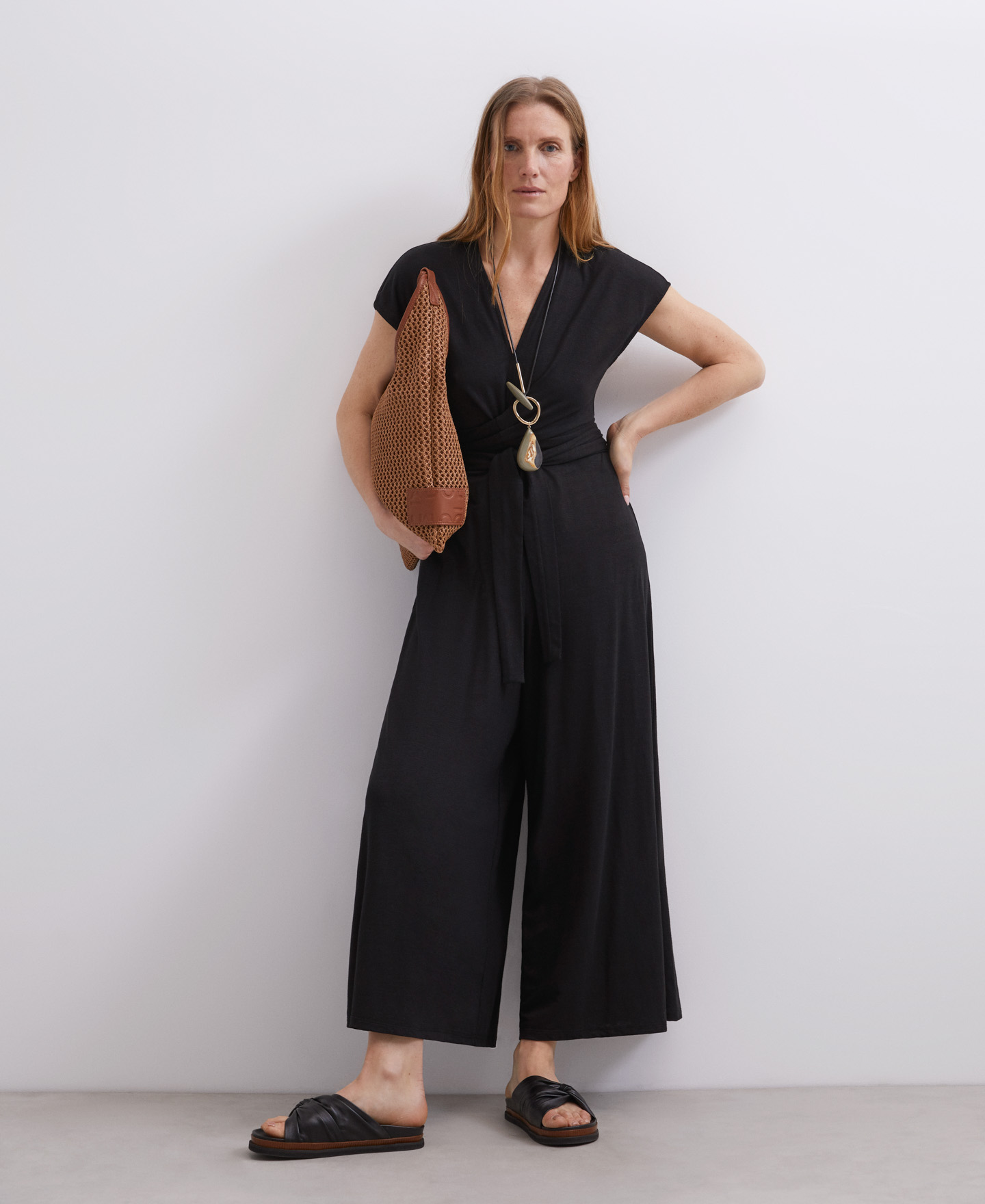 Black jumpsuit with linen belt detail image number 0
