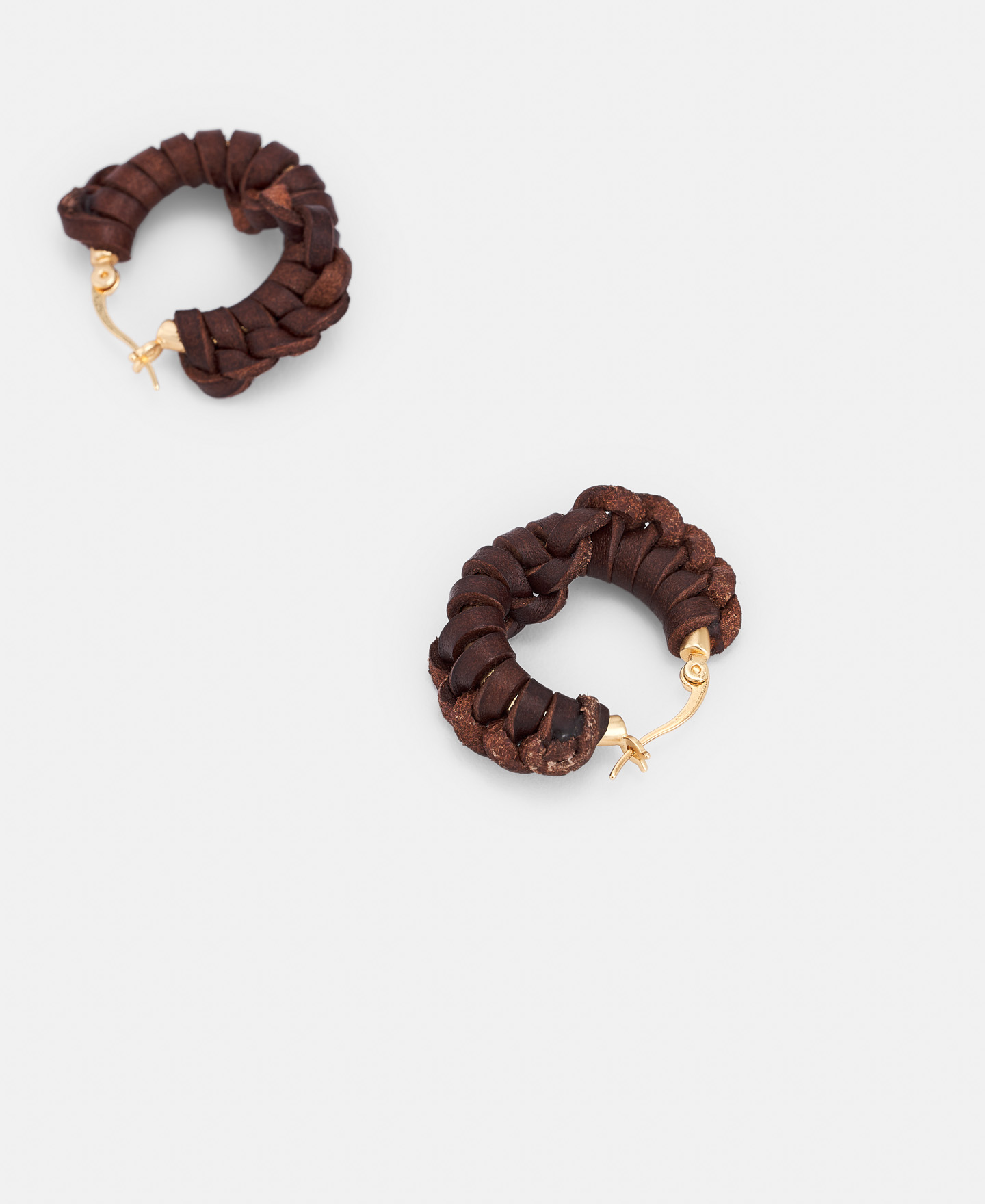 Braided leather hoop earring image number 1