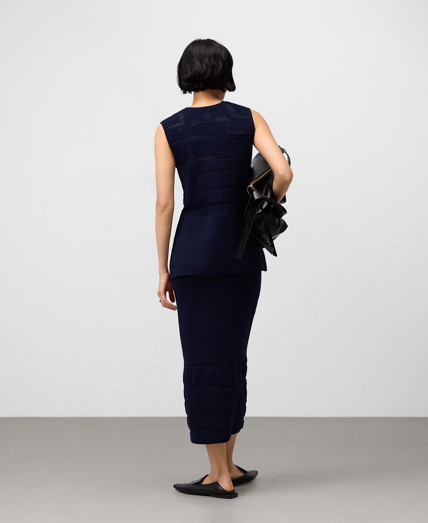 Saia reta em malha jacquard para mulher image number 2