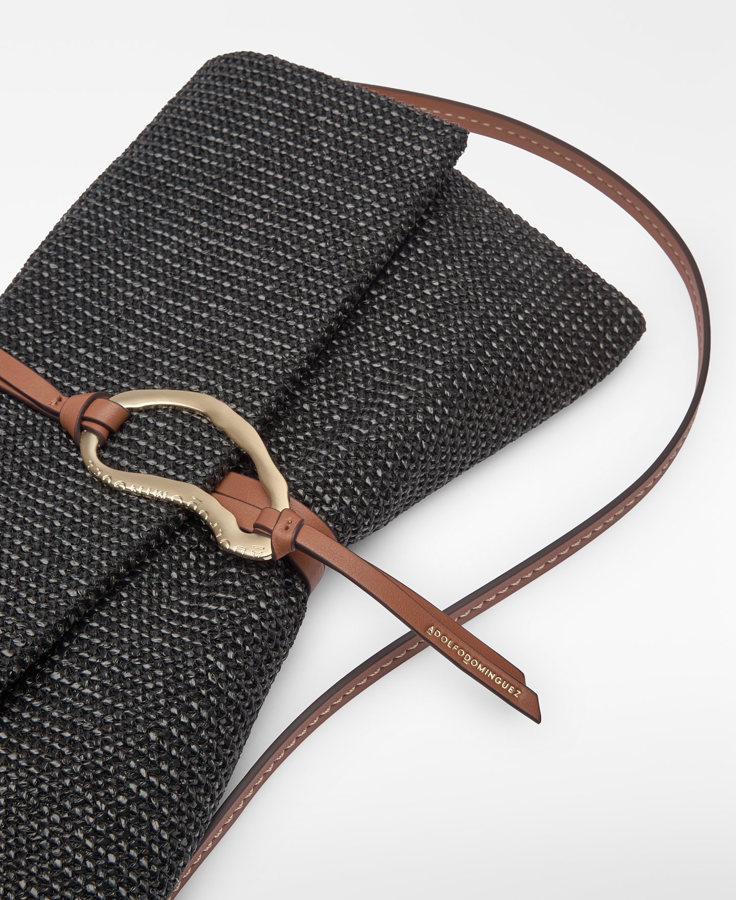 Raffia texture clutch with metal piece image number 2