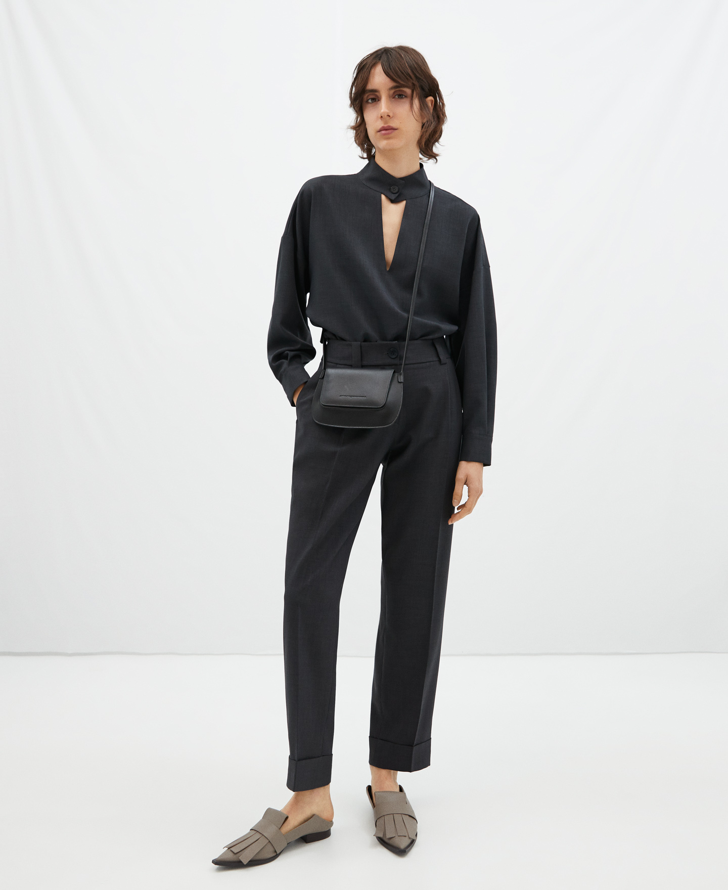 Banana fit pleated trousers image number 1