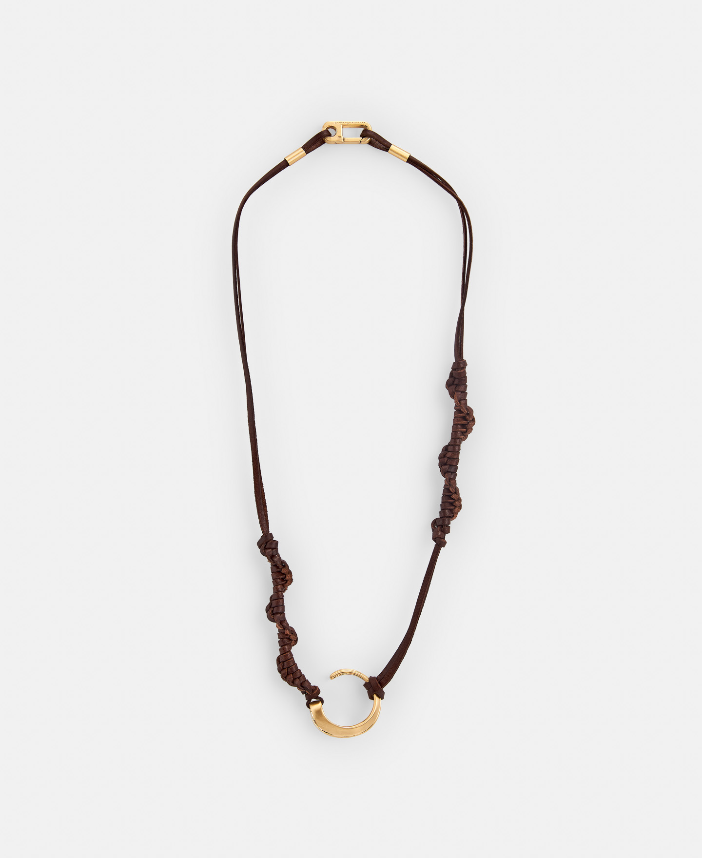 Metal pendant with braided leather image number 0