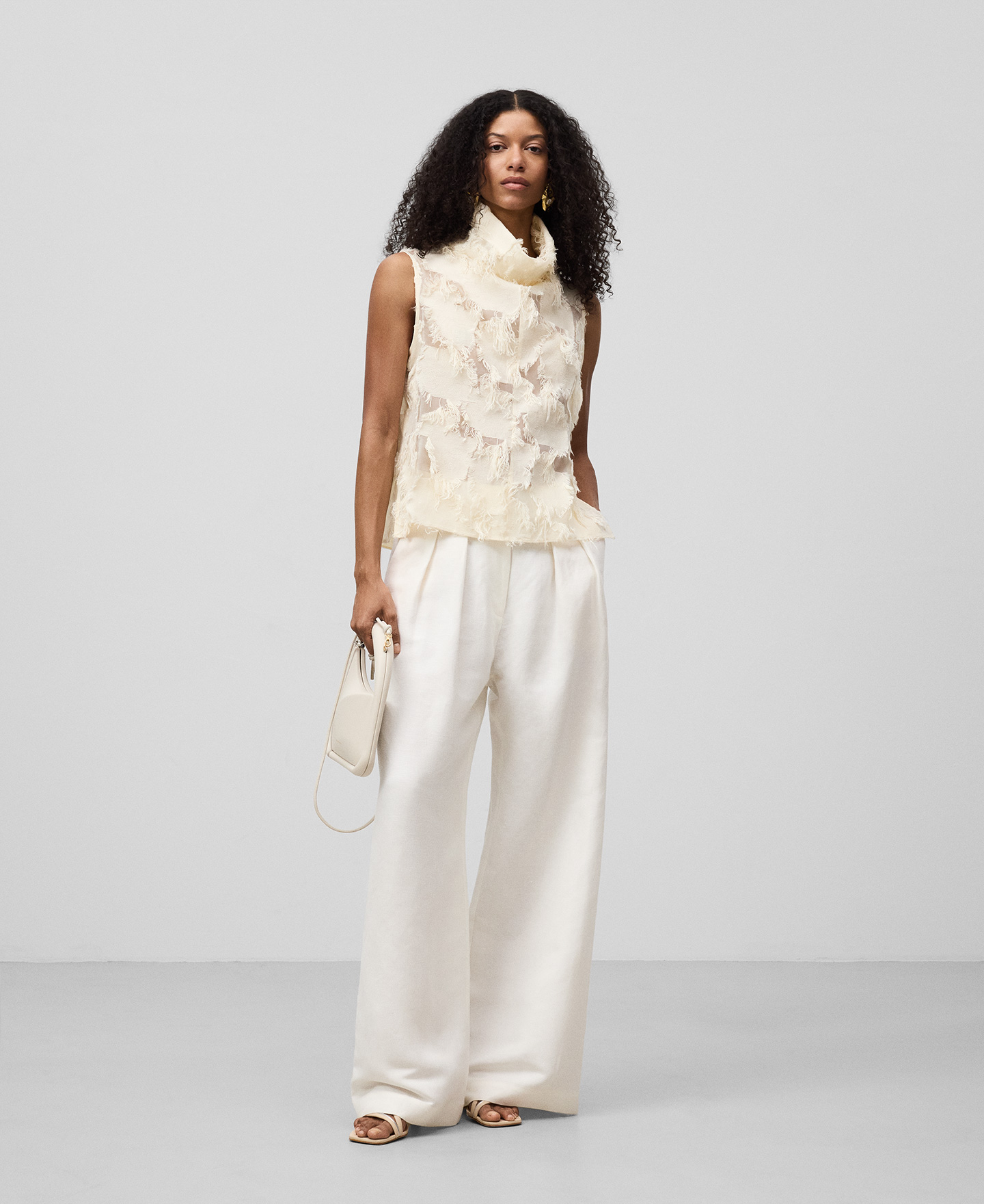 Semi-sheer top with fringe details woman image number 1