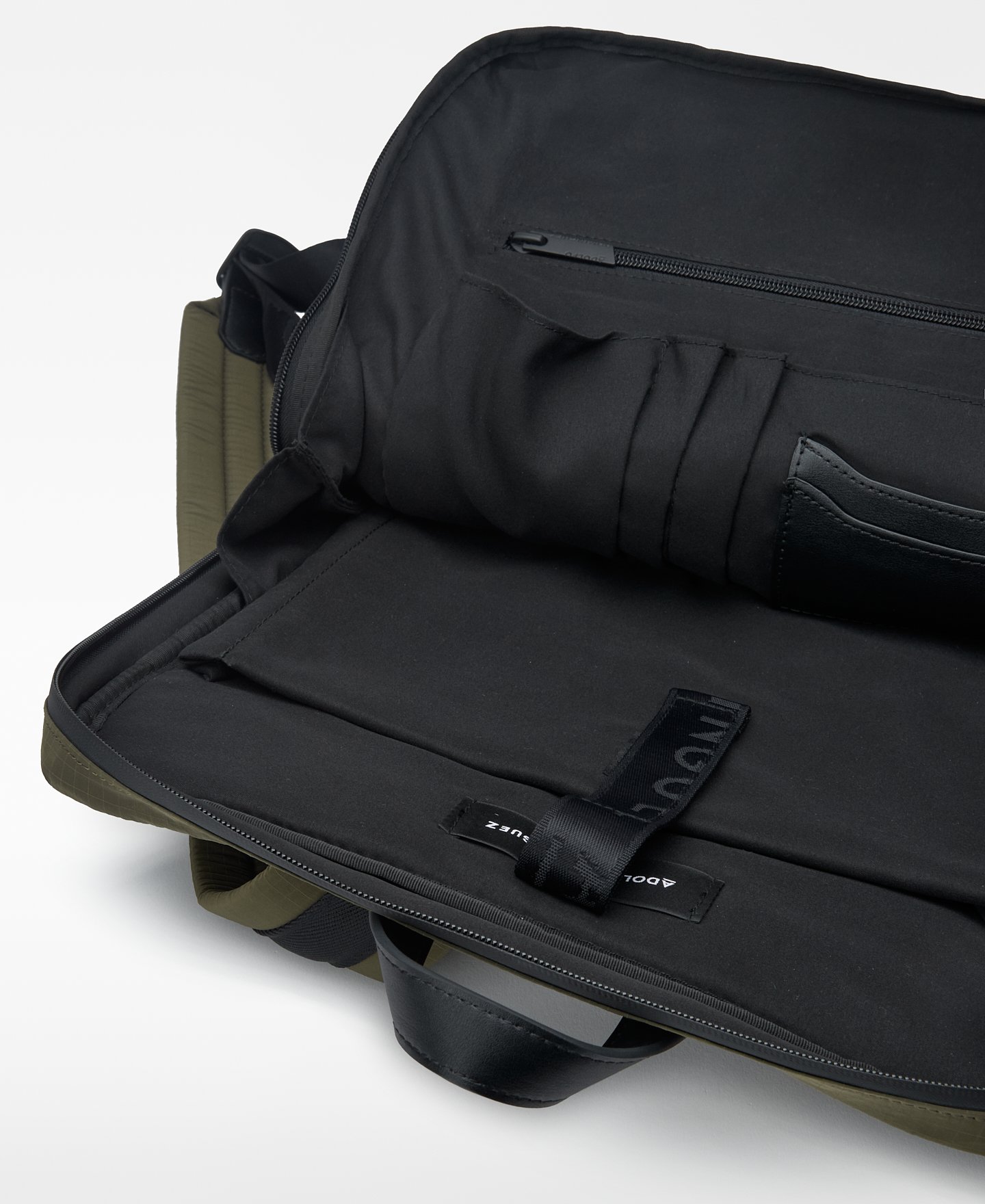 Green nylon compact backpack man image number 3