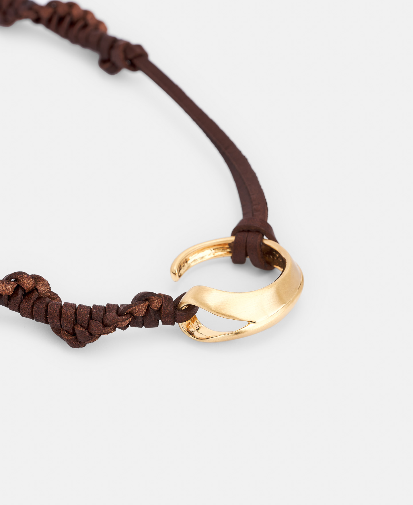 Metal pendant with braided leather image number 1