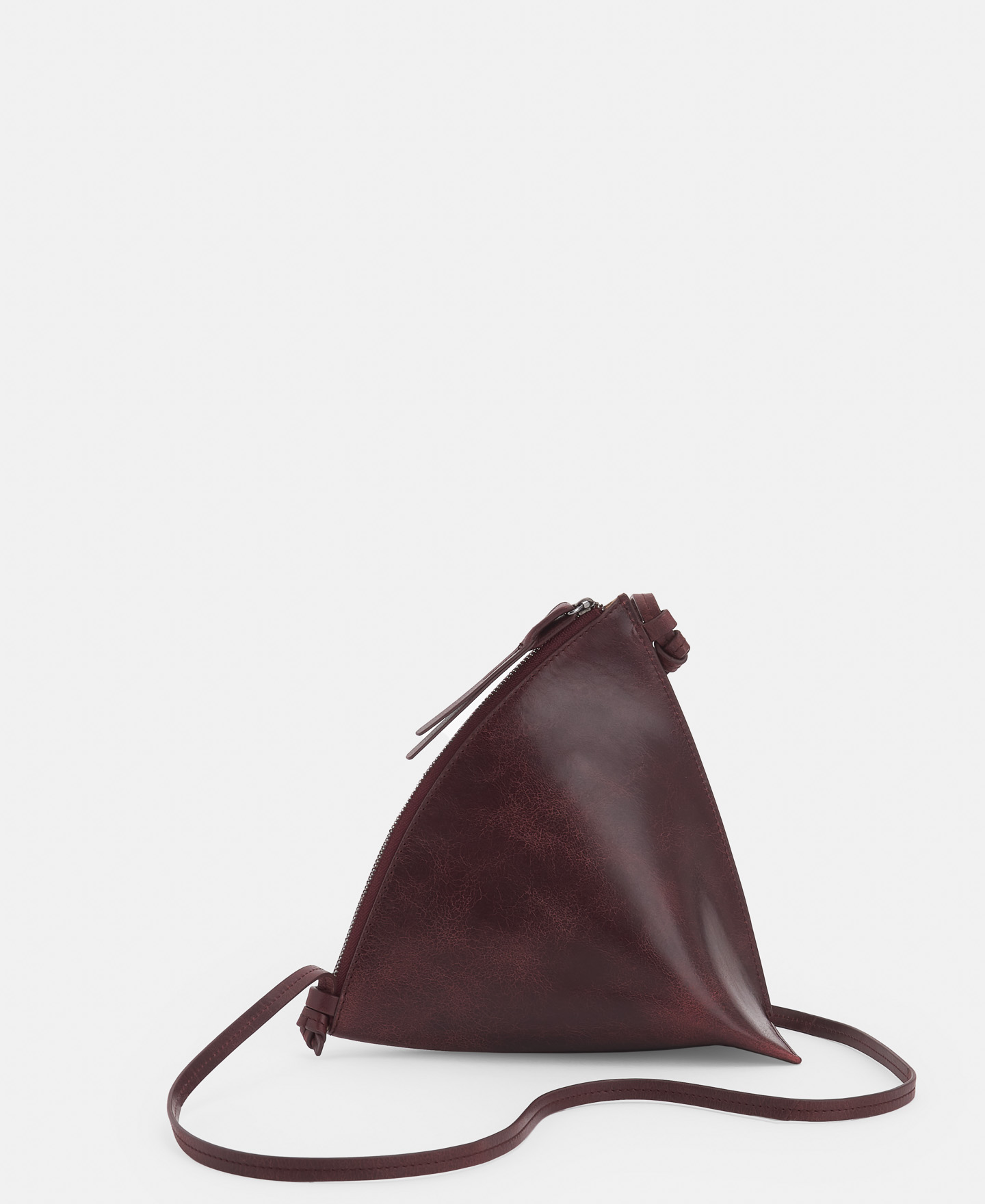 Triangular leather clutch image number 1