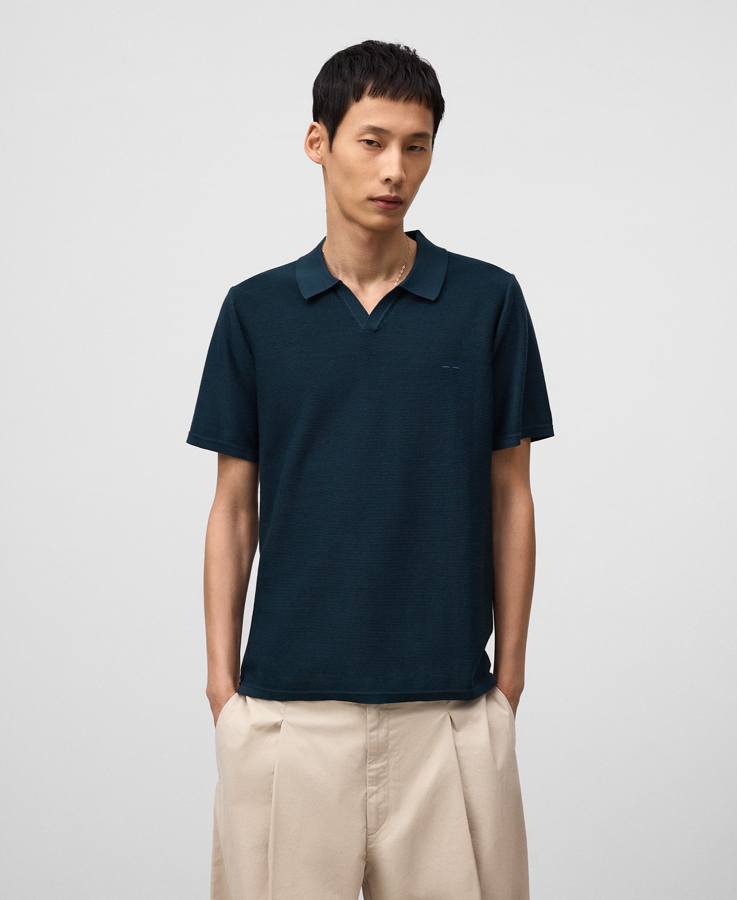 V-neck structured knit polo shirt man image number 0