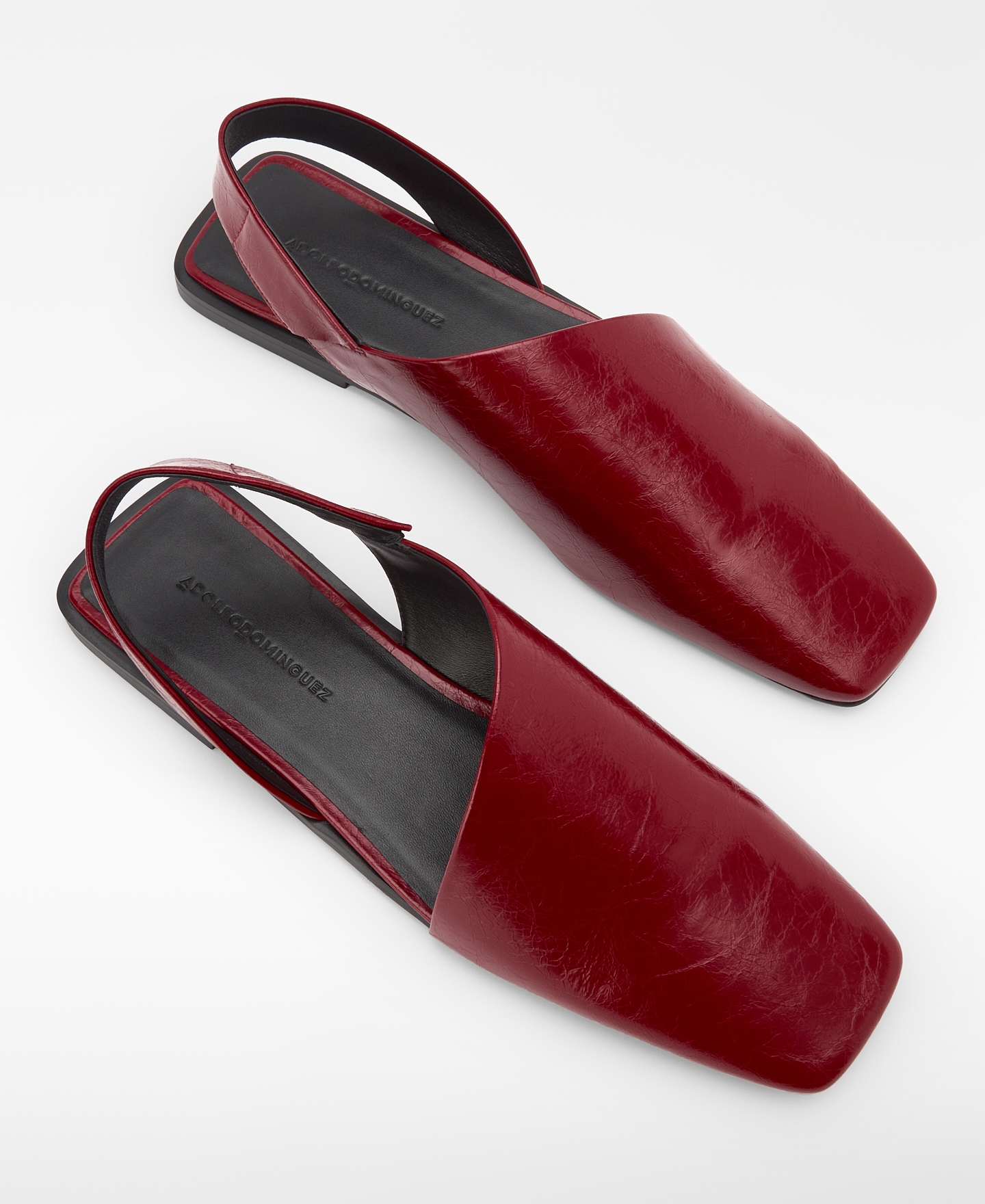 Asymmetric leather mules image number 1