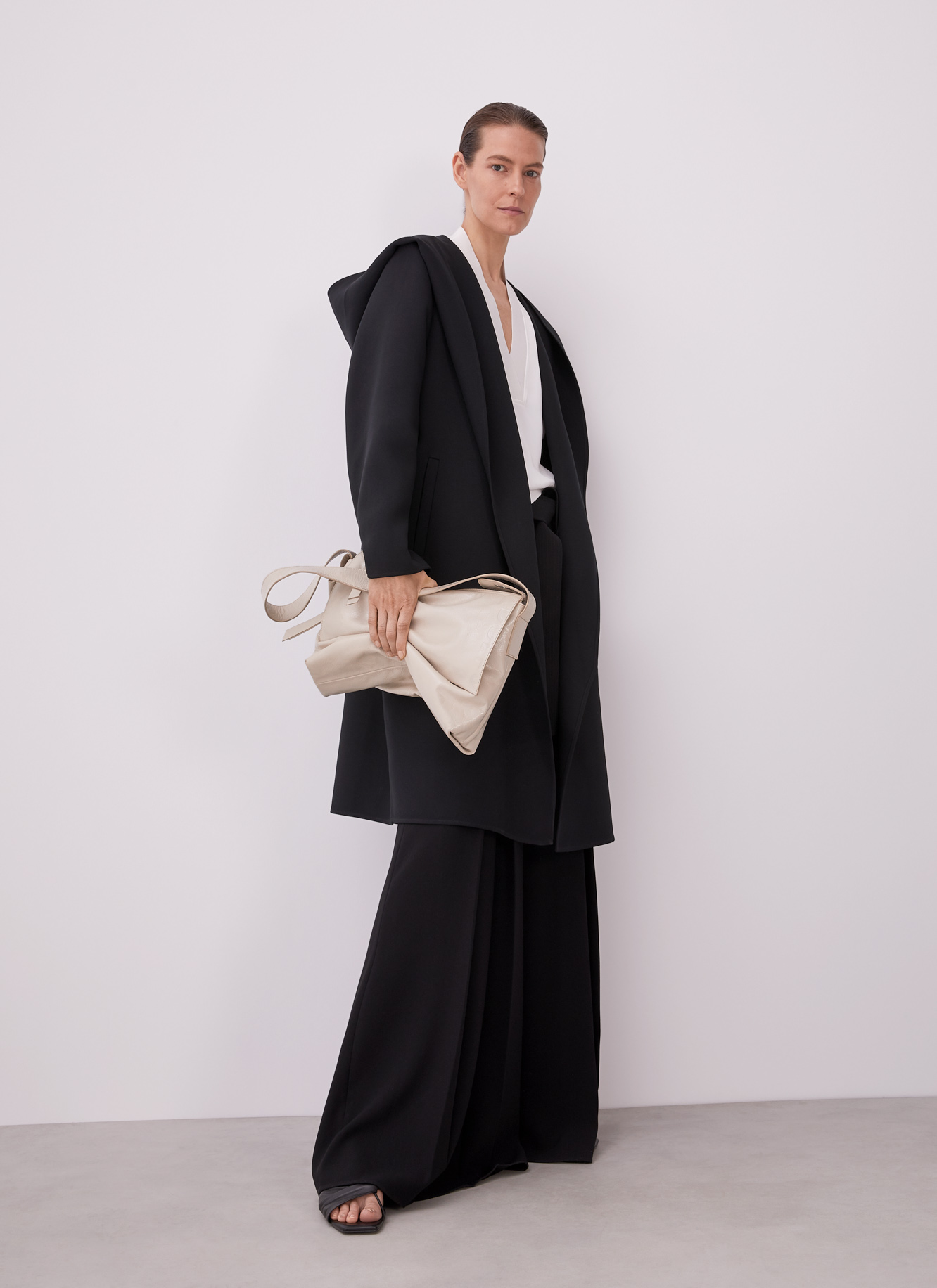 Long coat with lapels and hood image number 5