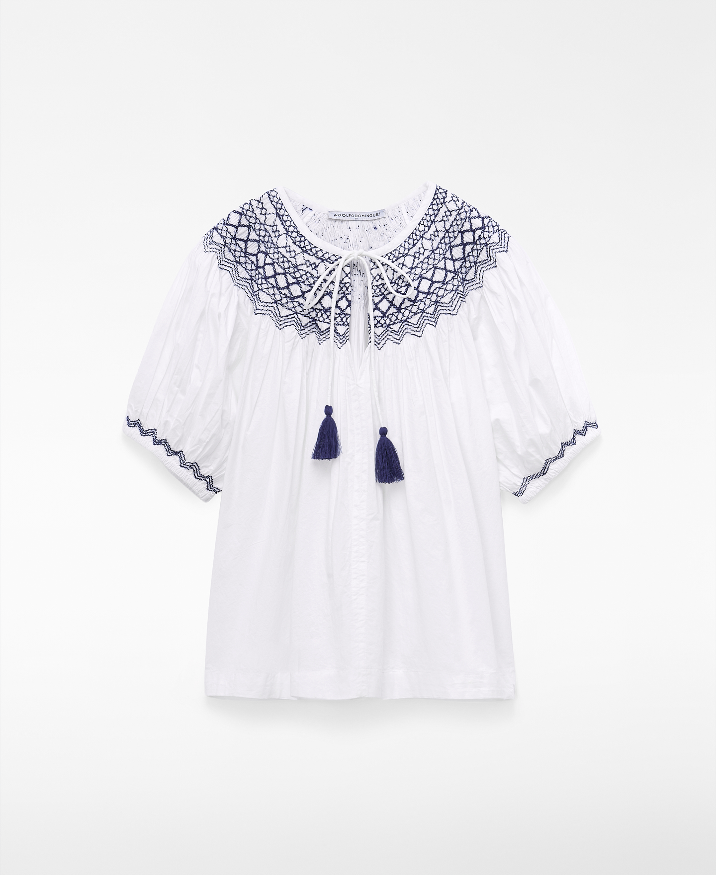 Blusa nido de abeja borlas image number 4