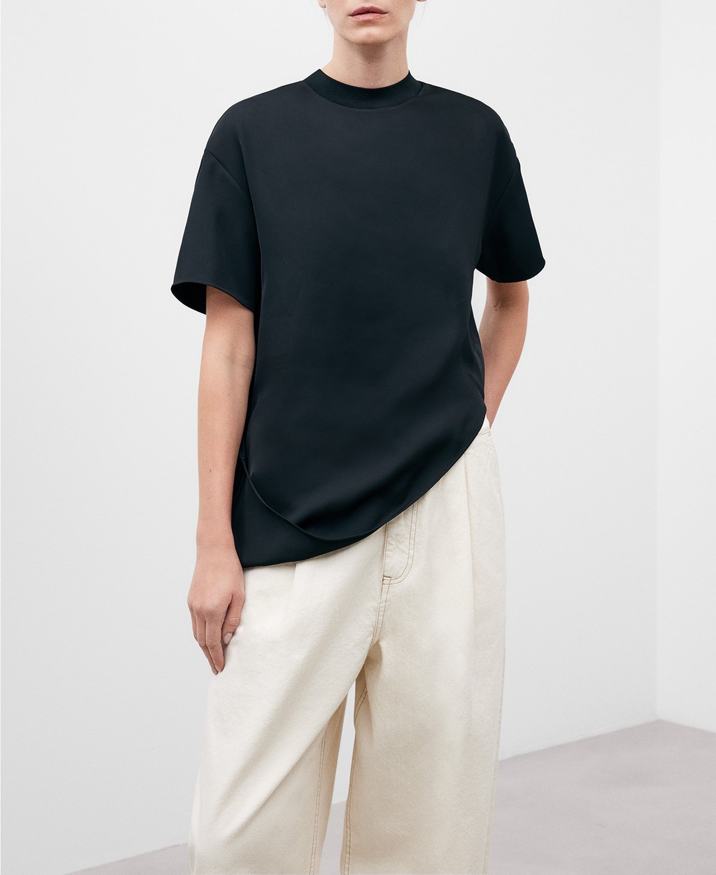 Black asymmetric T-shirt for women image number 0