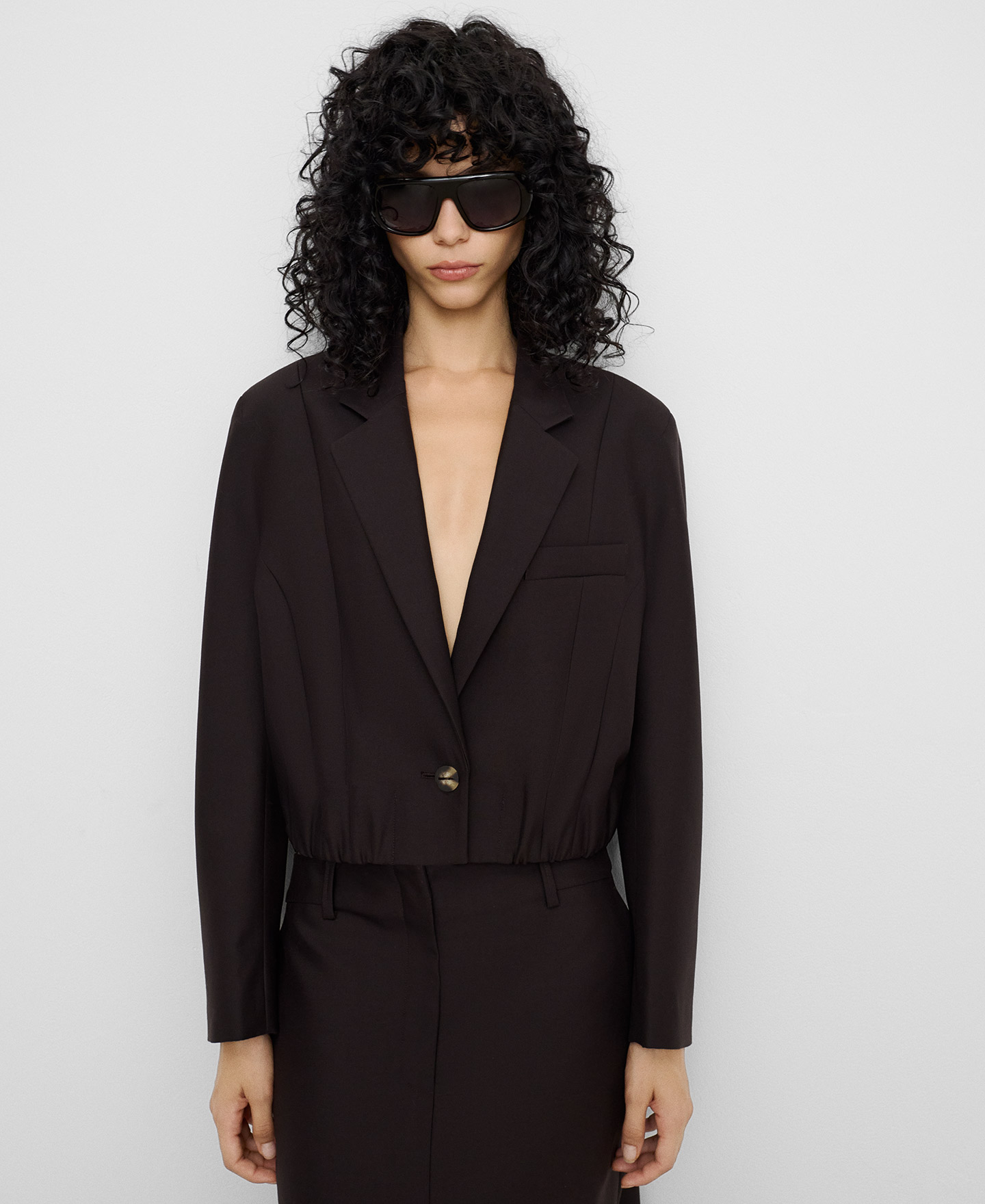 Short tailored blazer with elastic hem image number 0