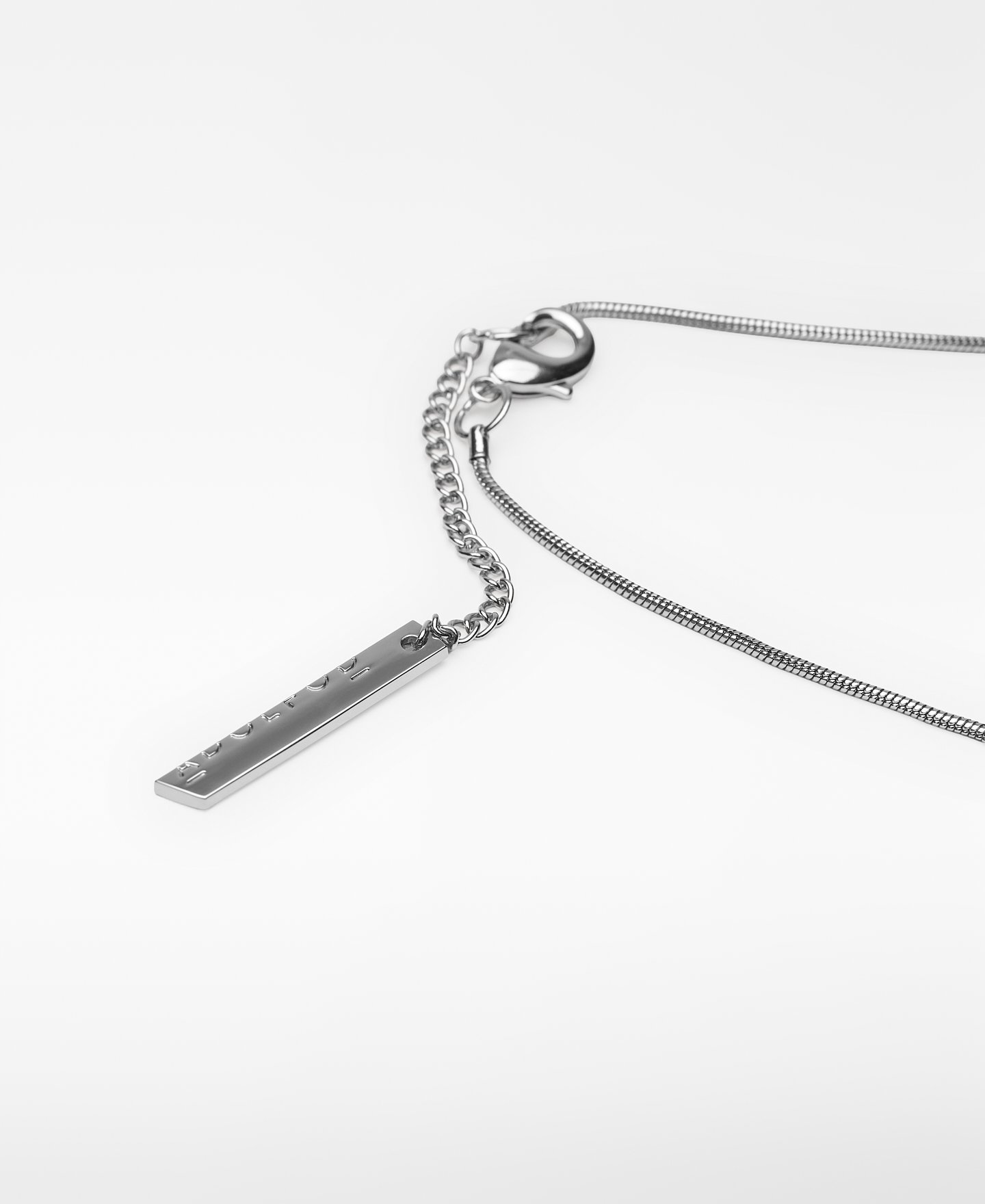 Metal necklace with two-tone resin piece image number 2