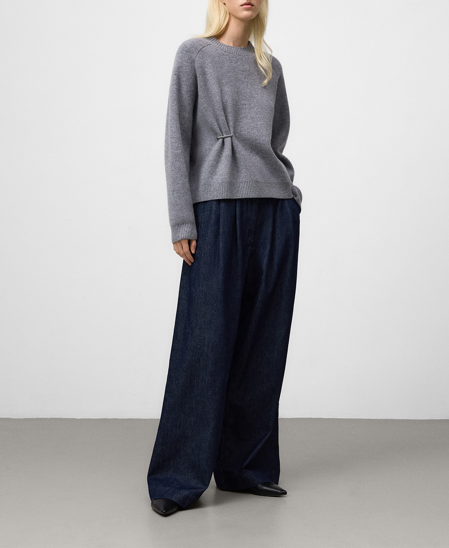 Wool sweater with metal piece image number 1