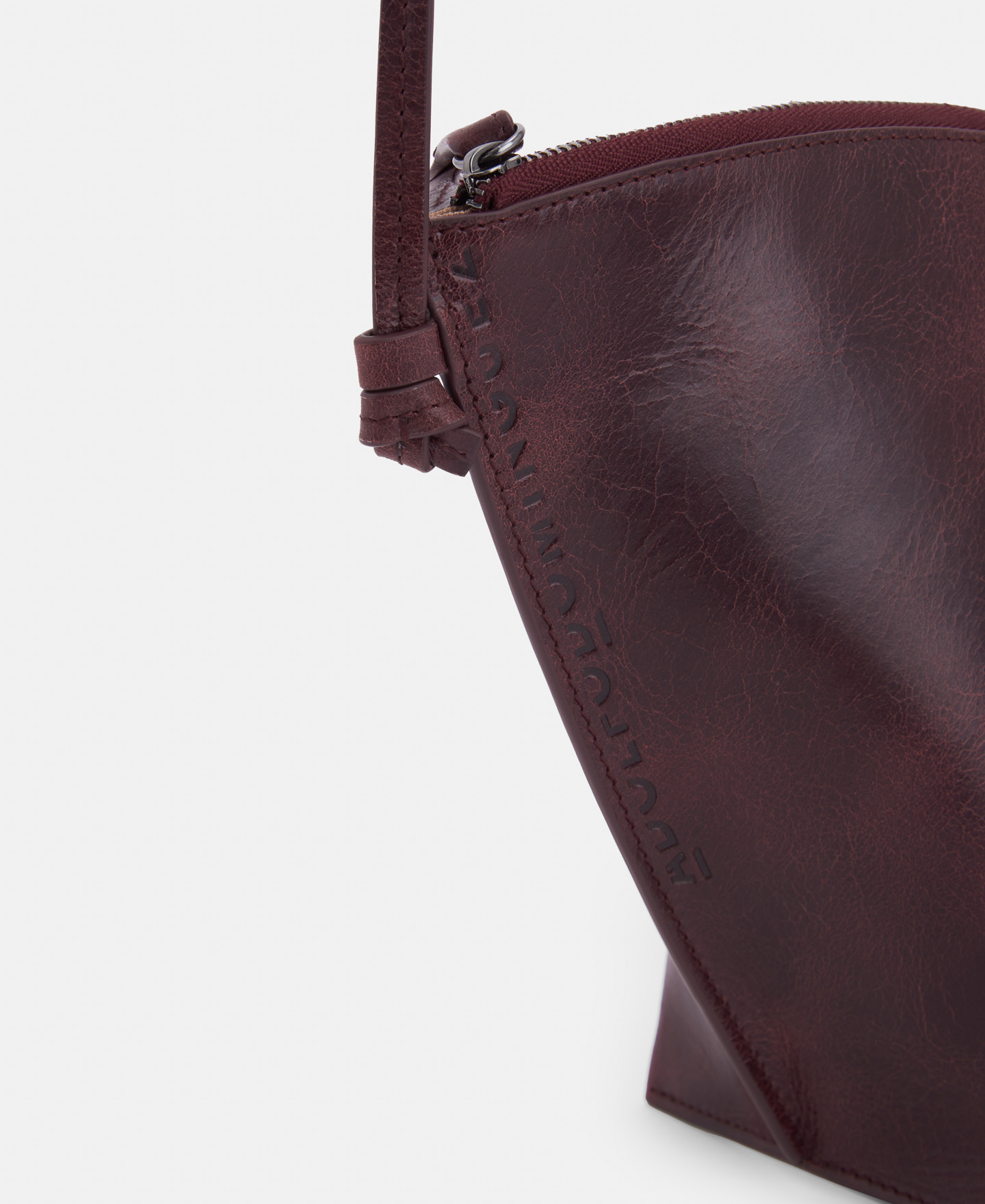 Triangular leather clutch image number 3