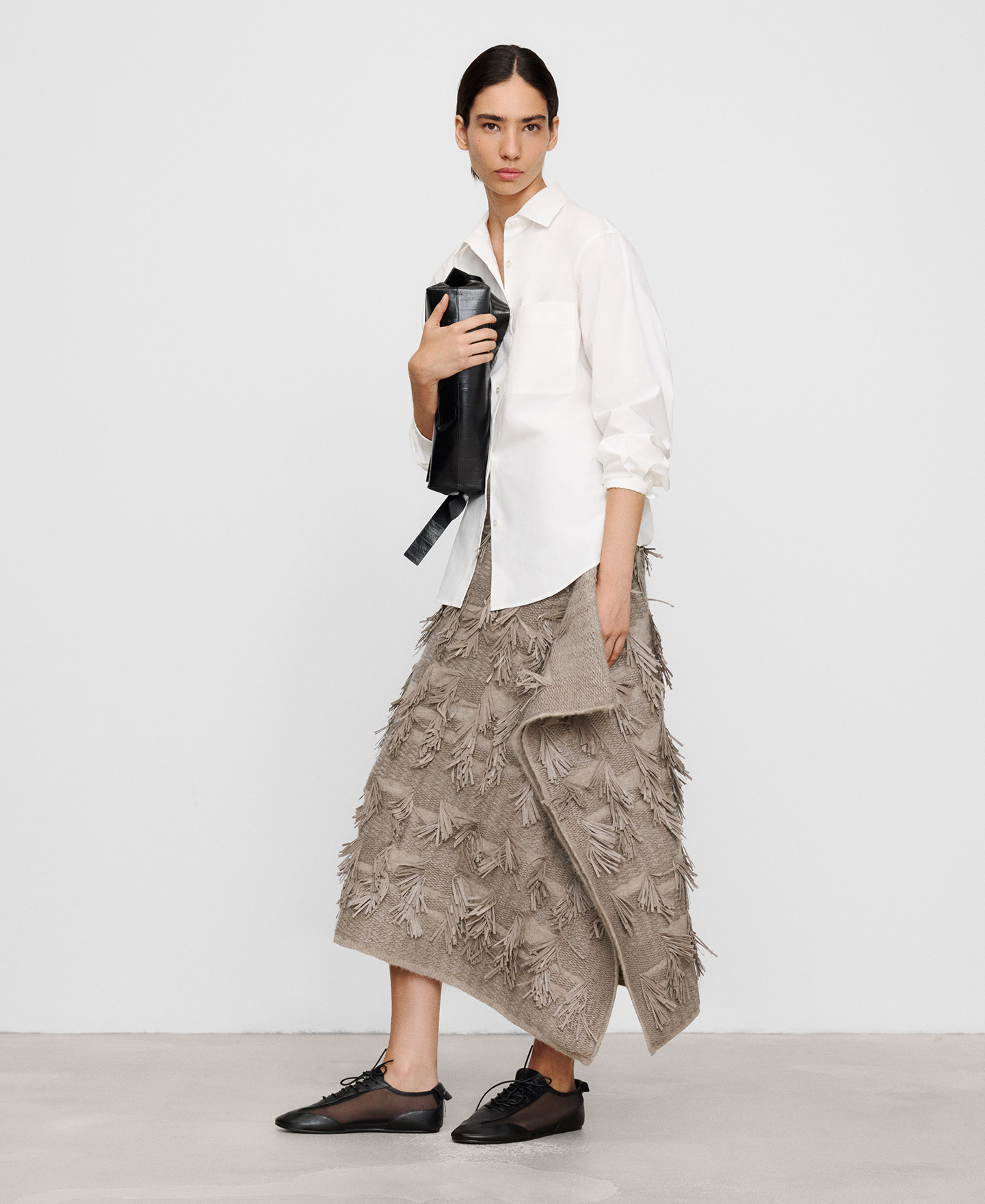 Falda asim&eacute;trica punto jacquard flecos image number 1