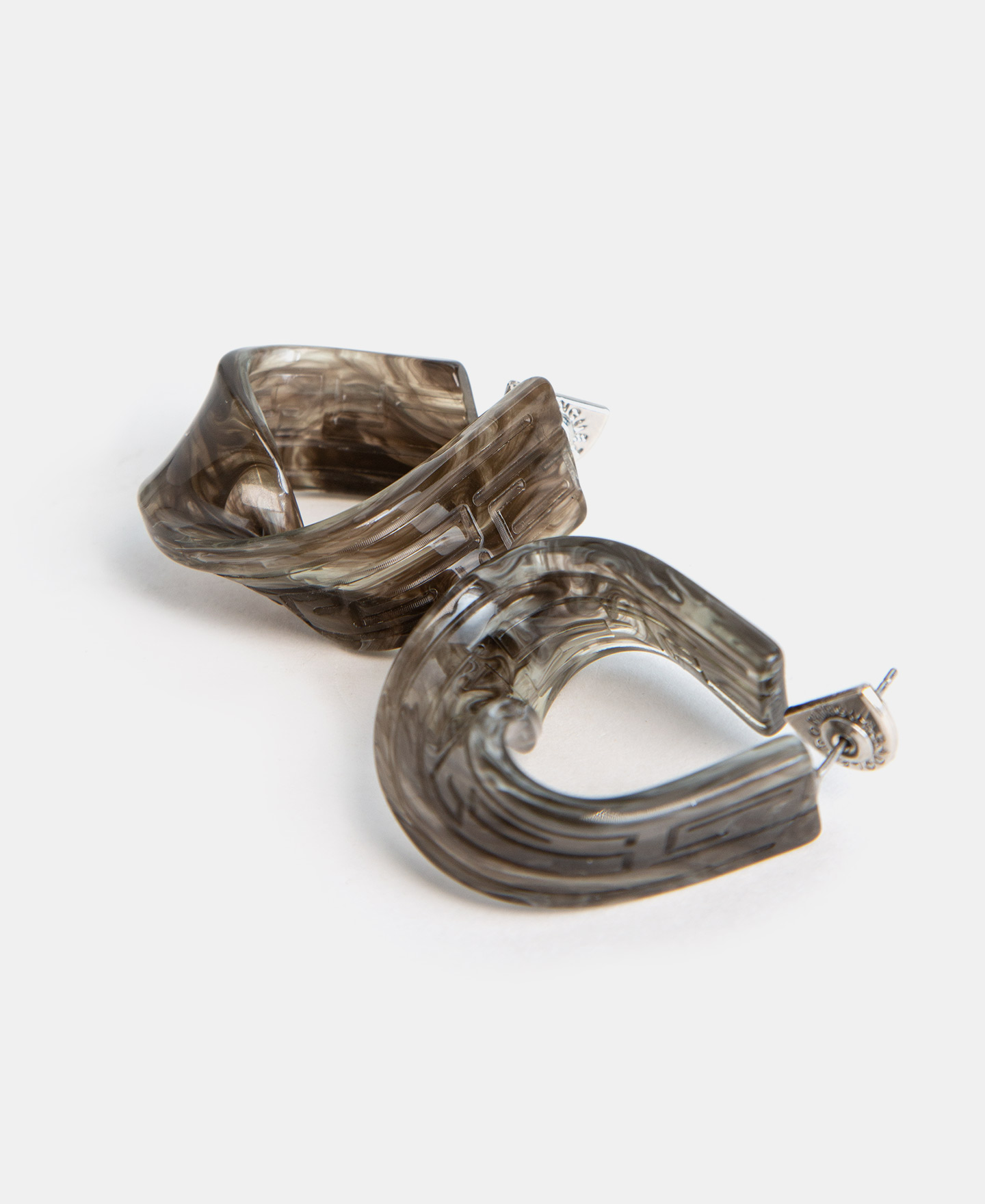 Resin labyrinth motif earrings image number 1