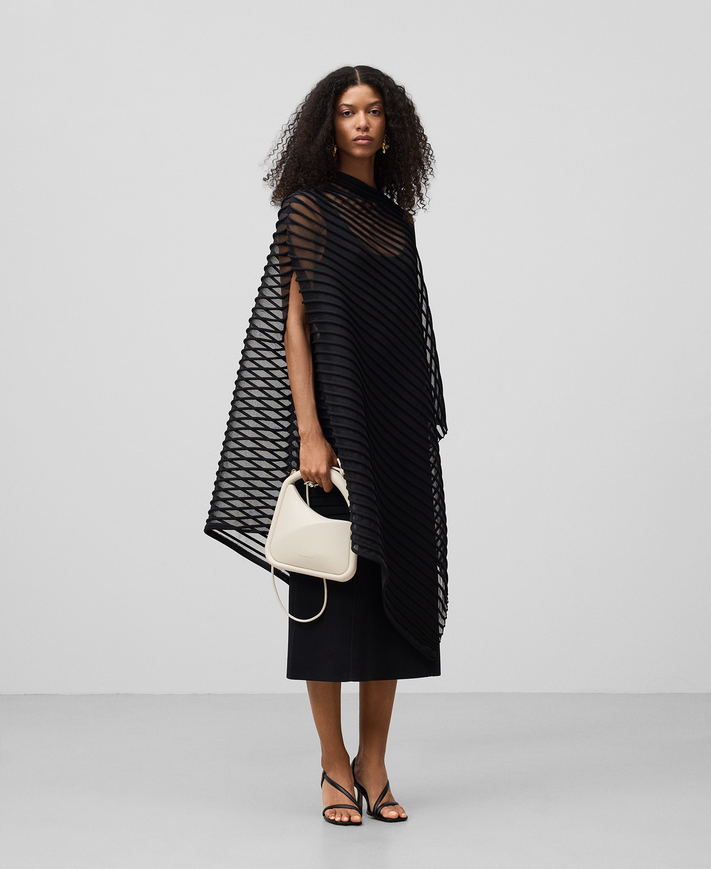 Asymmetrical semi-transparent cape woman image number 1