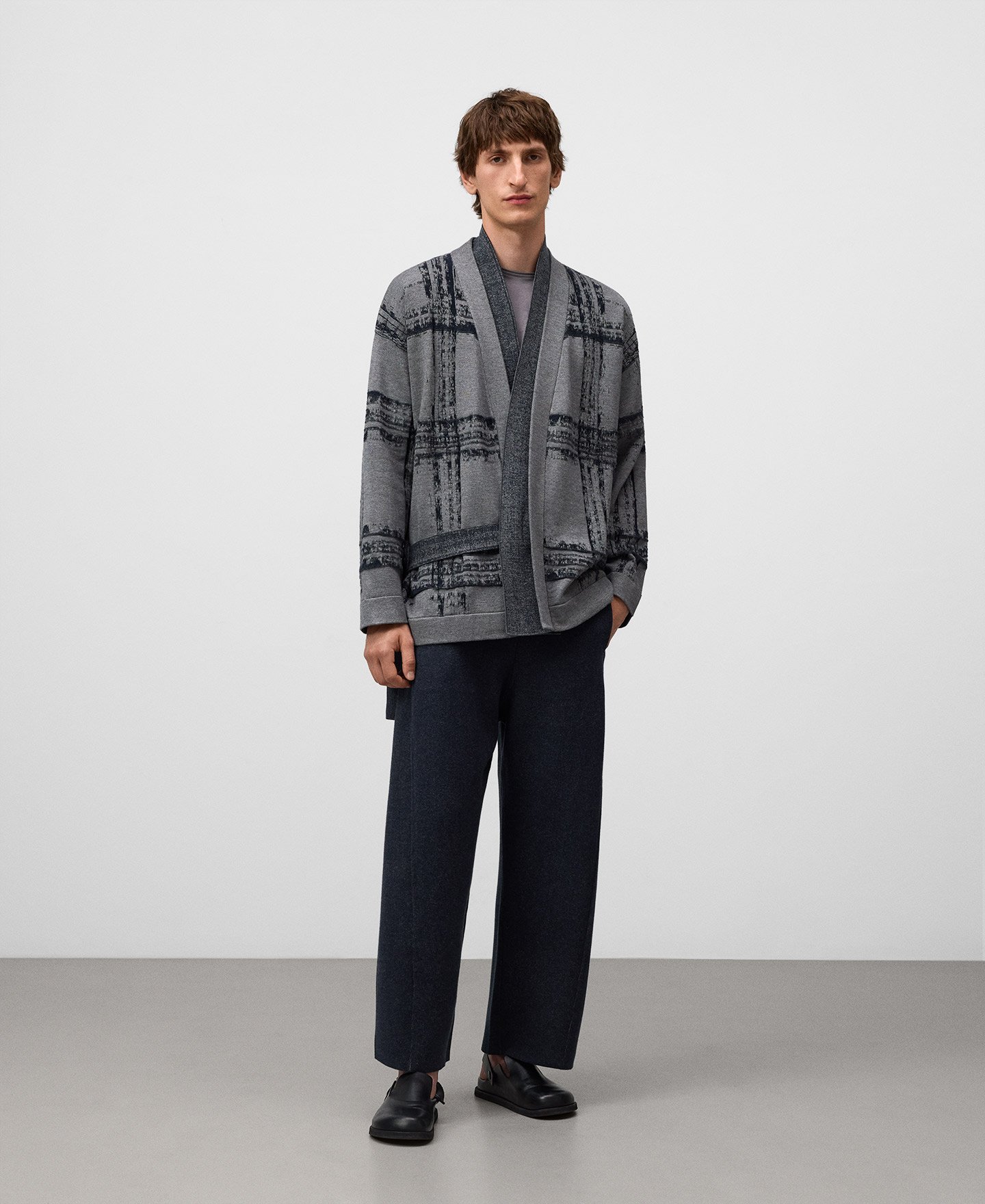 Knit barrel fit trousers man image number 1