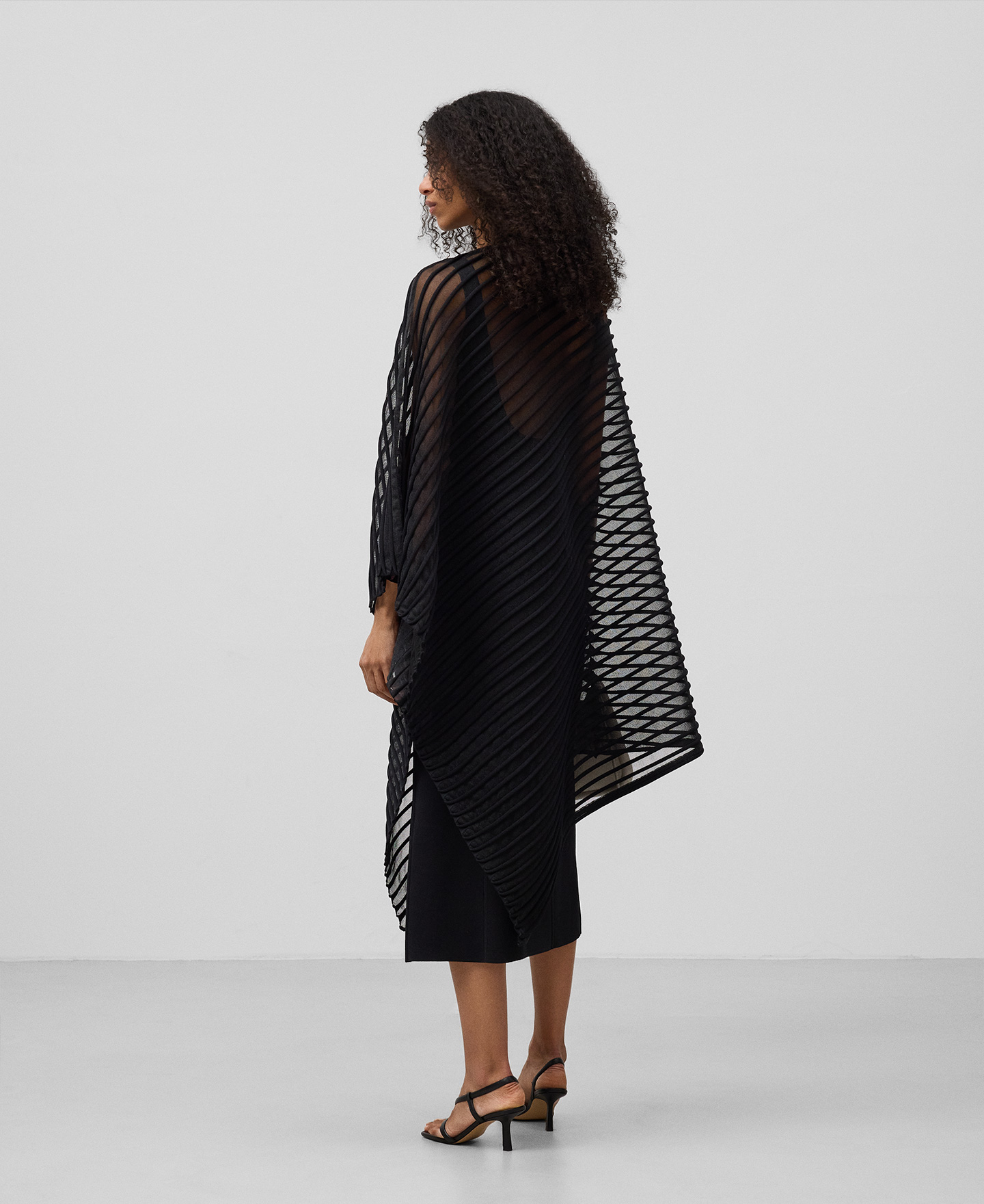 Asymmetrical semi-transparent cape woman image number 2
