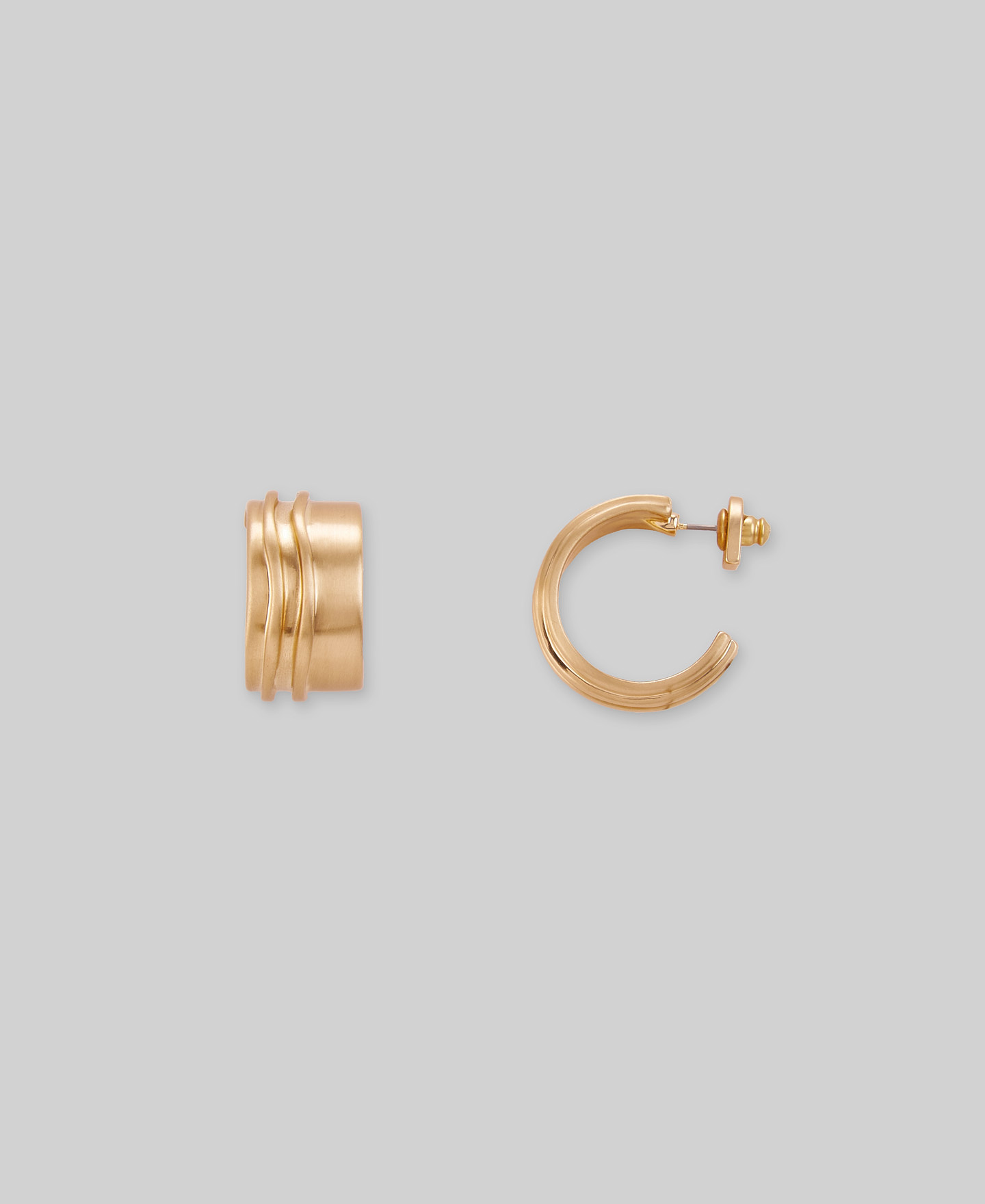 Irregular grooved gold hoops woman image number 0