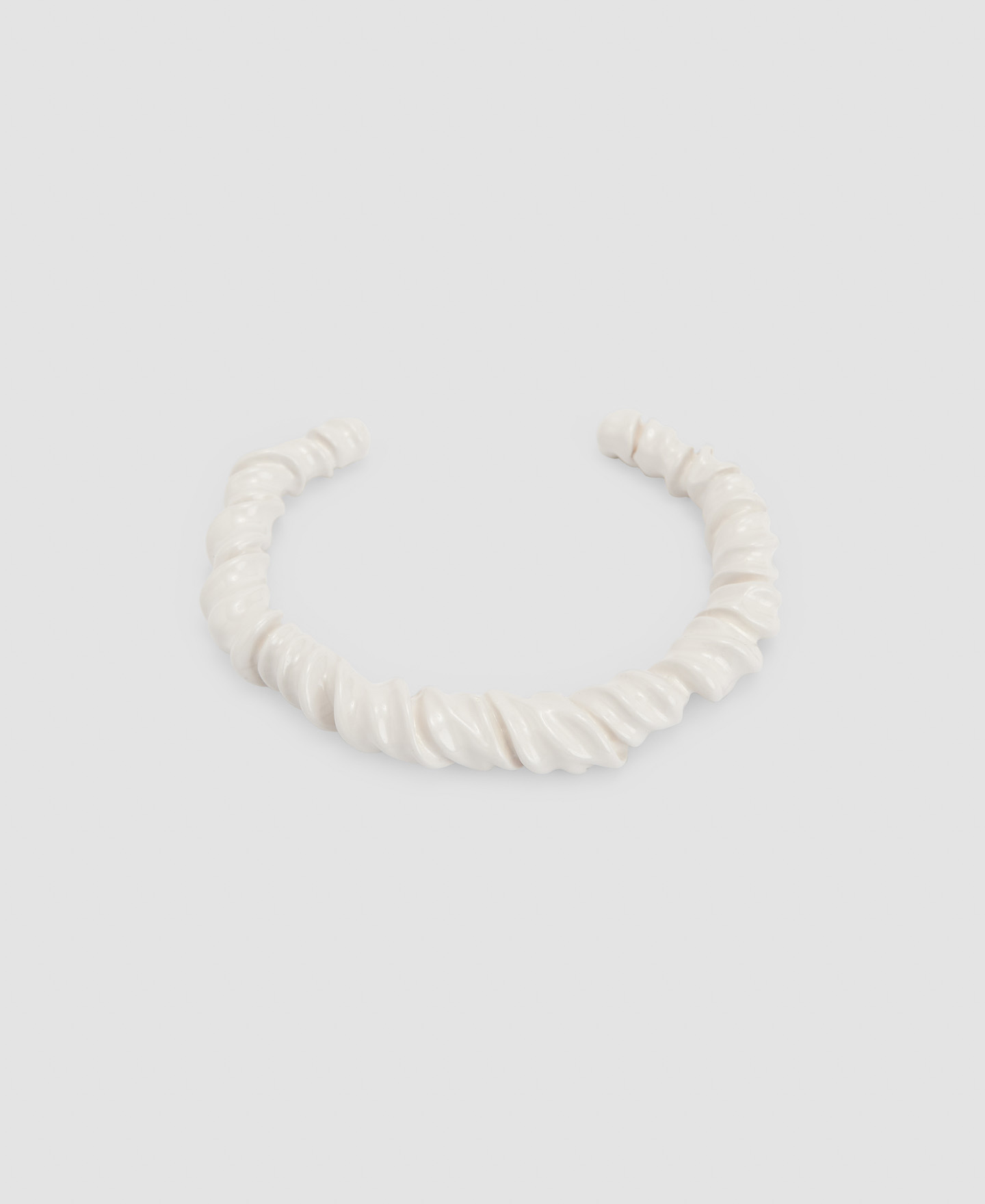 Zinc and resin coiled bracelet image number 0