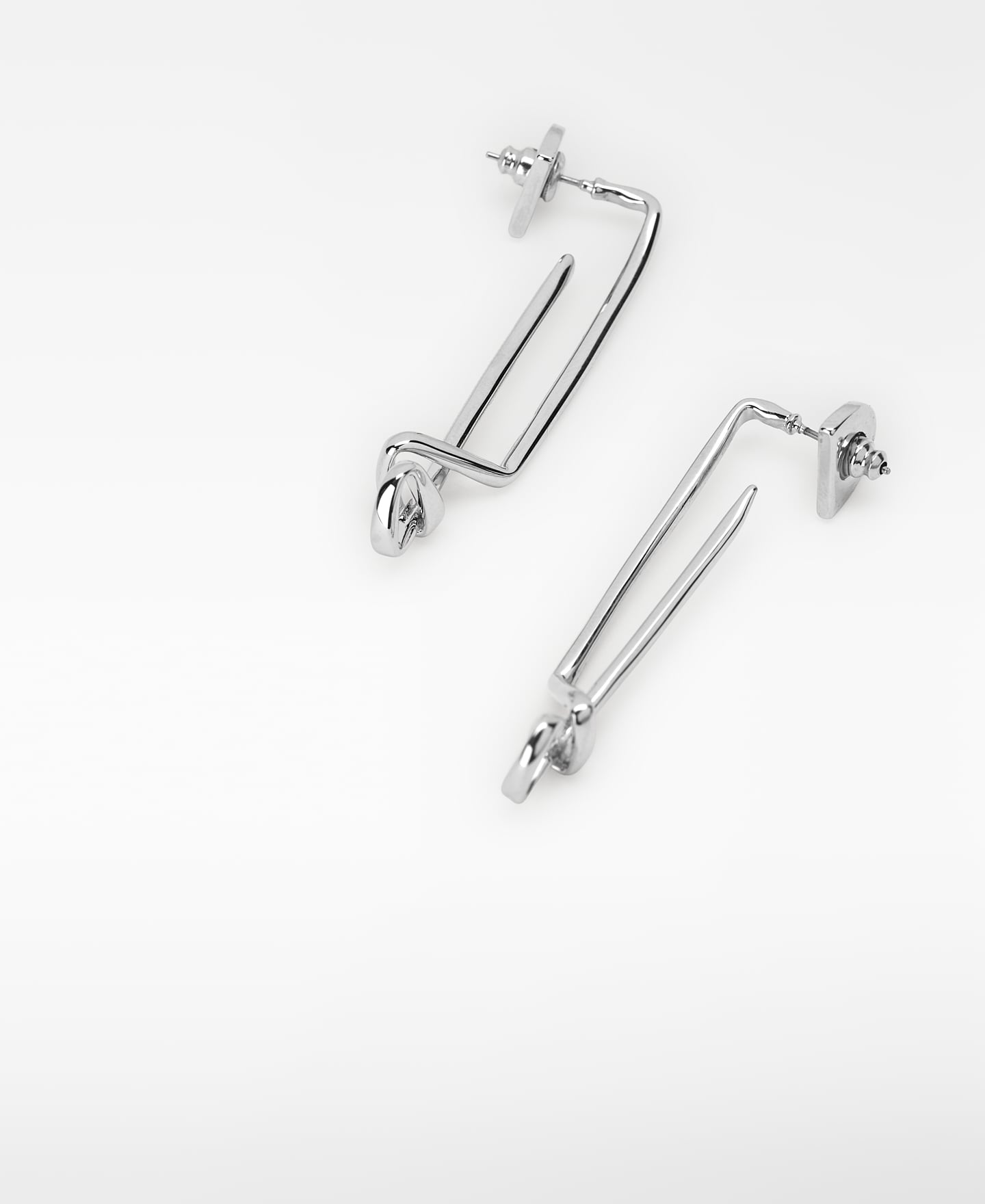 Irregular knot metal earrings image number 2
