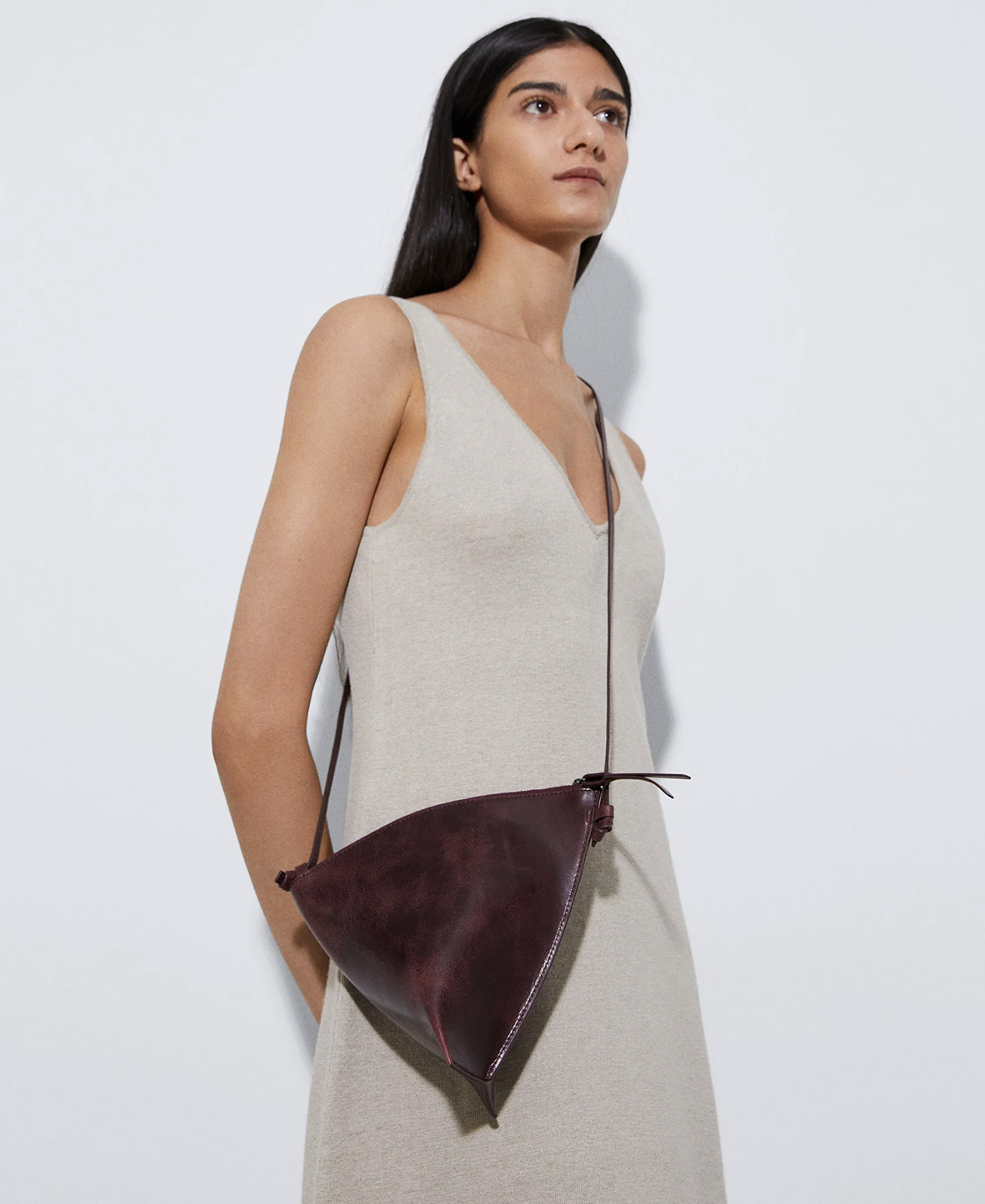 Triangular leather clutch image number 4