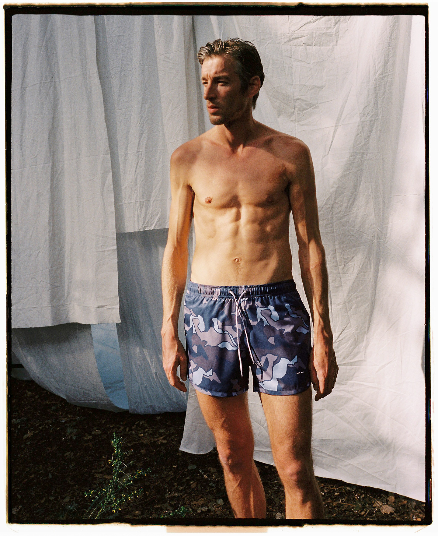 Blue printed swim shorts image number 0