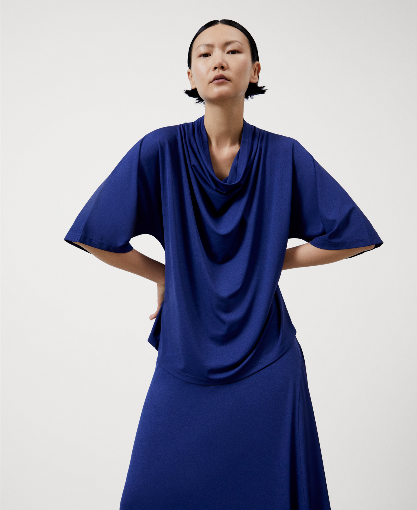 Fluid blouse draped neckline image number 0