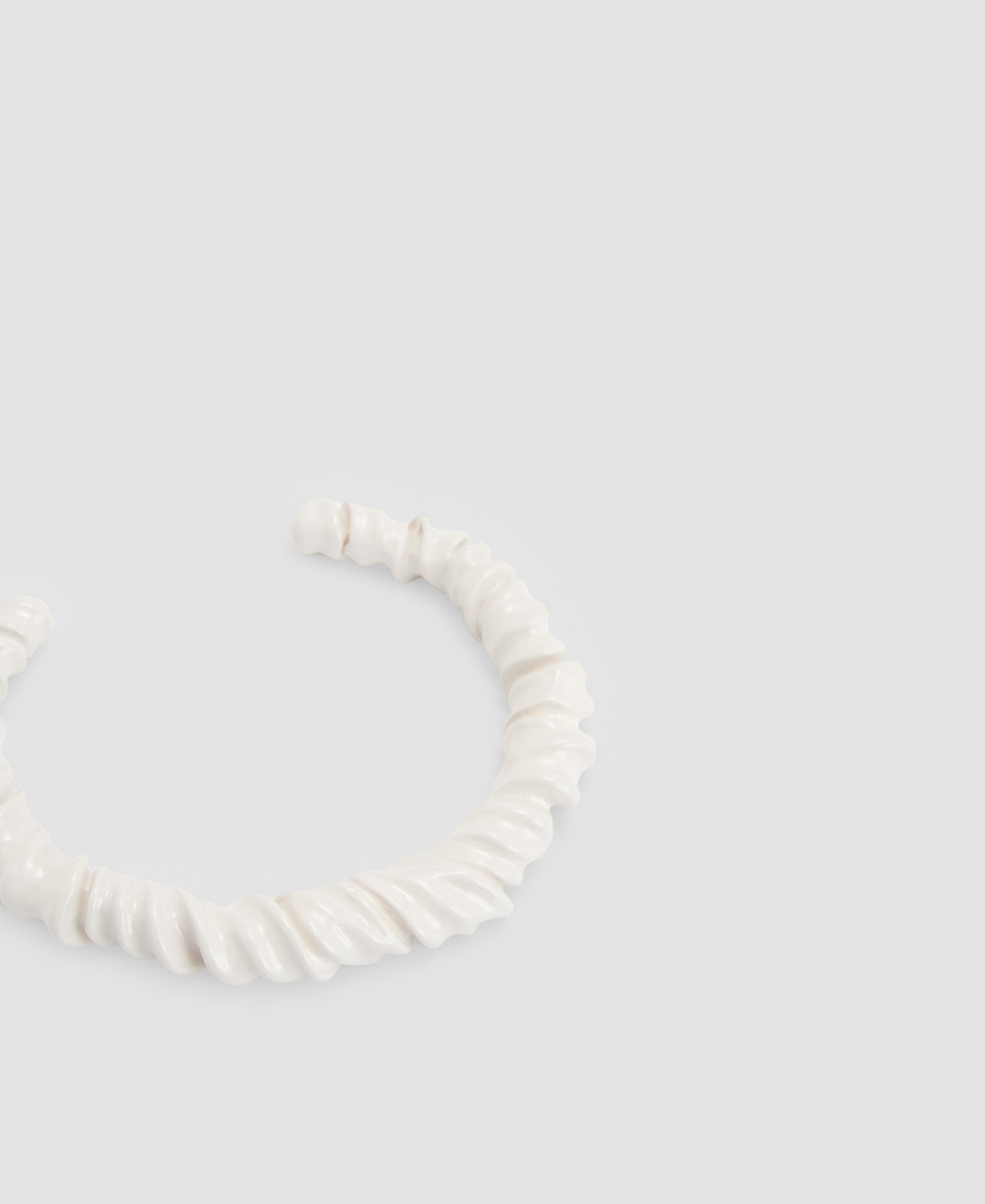 Zinc and resin coiled bracelet image number 1