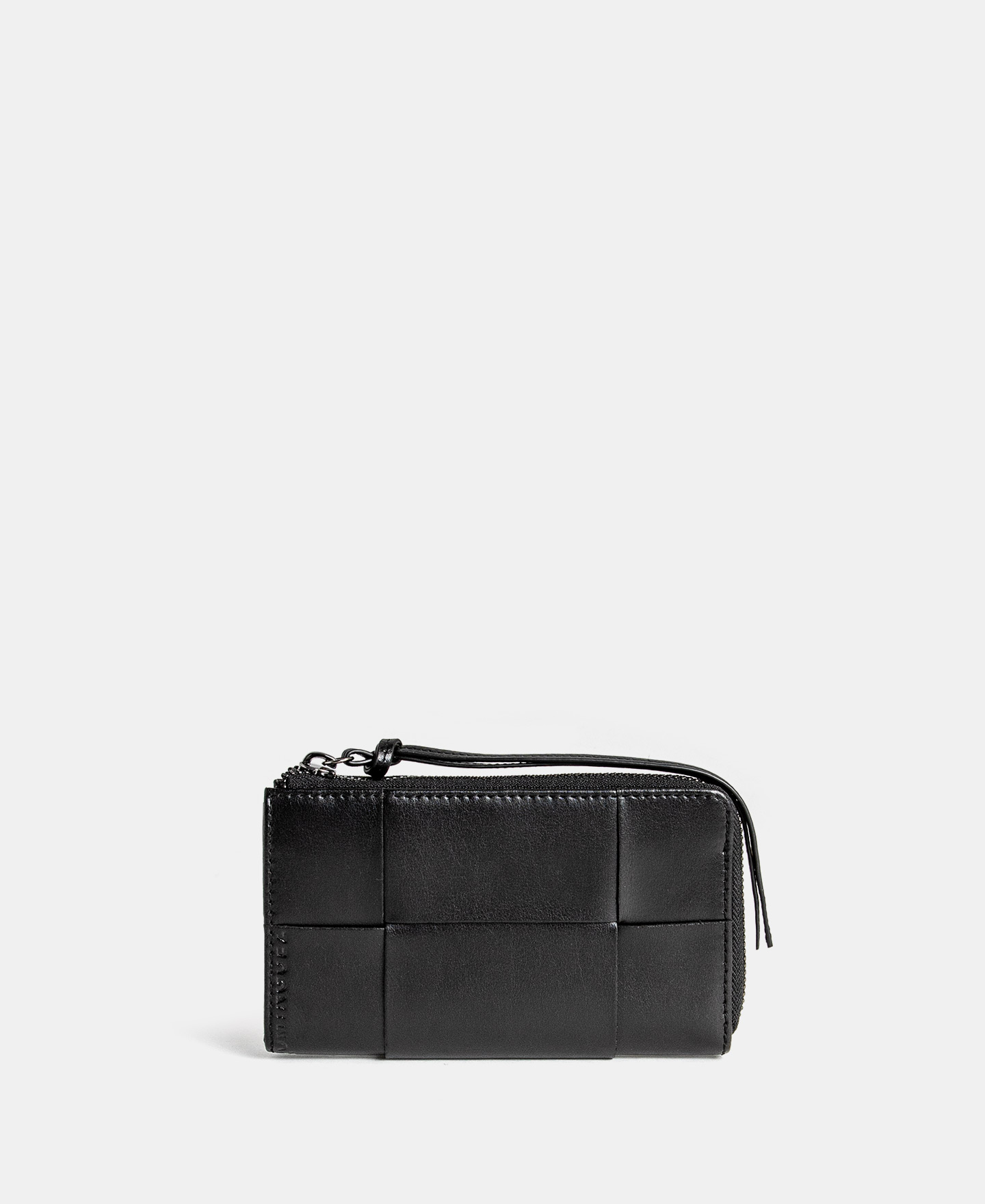 Cartera trenzada en piel vaqueta image number 0