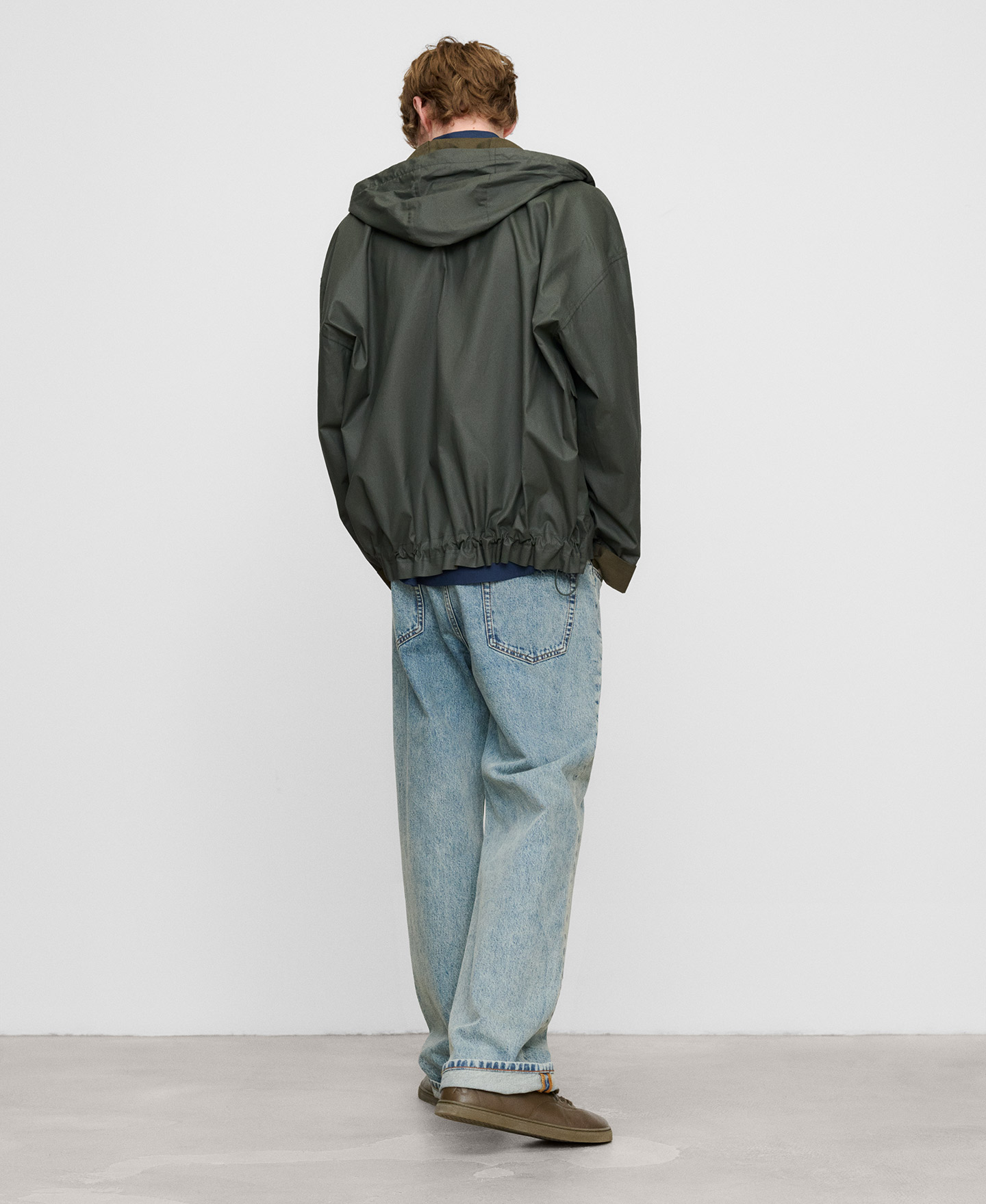 Bootcut washed-effect denim trousers image number 2