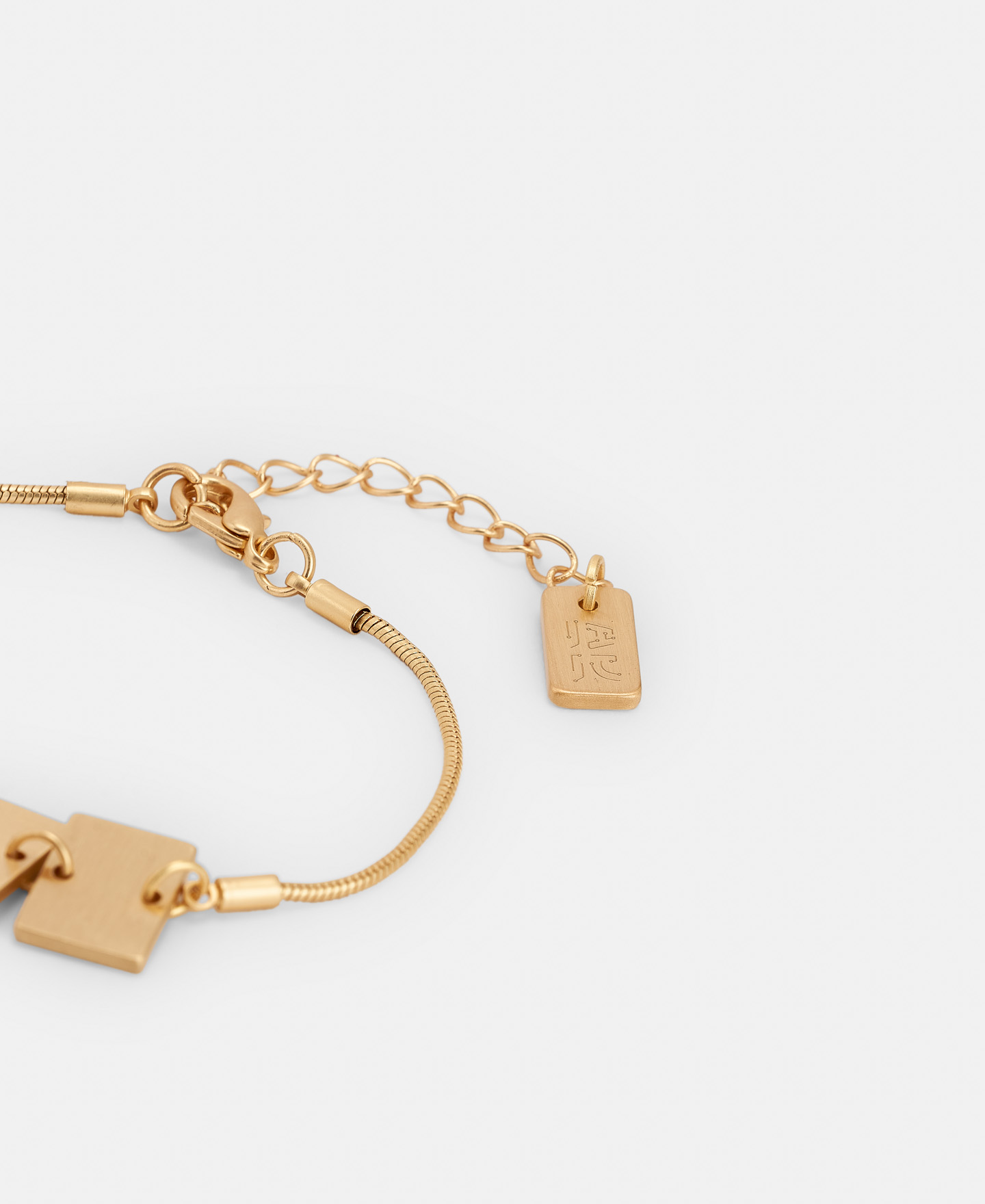 Bracelet with microchip motif in brass image number 1