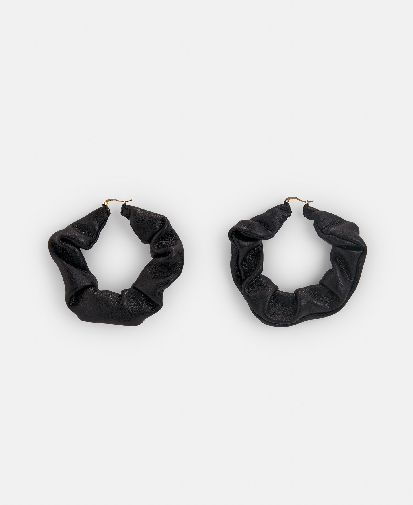 Pendientes de aro en aspecto piel image number 0
