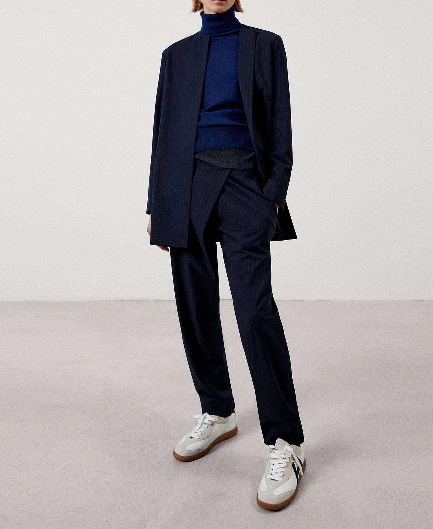 Asymmetric straight trousers image number 1