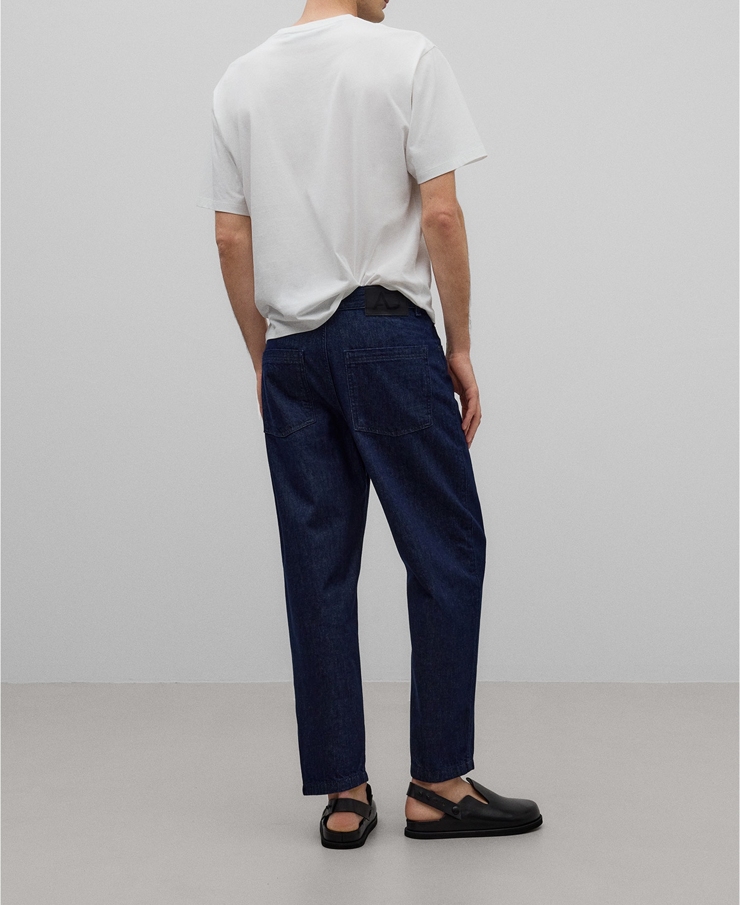 Carrot fit cotton denim trousers man image number 2