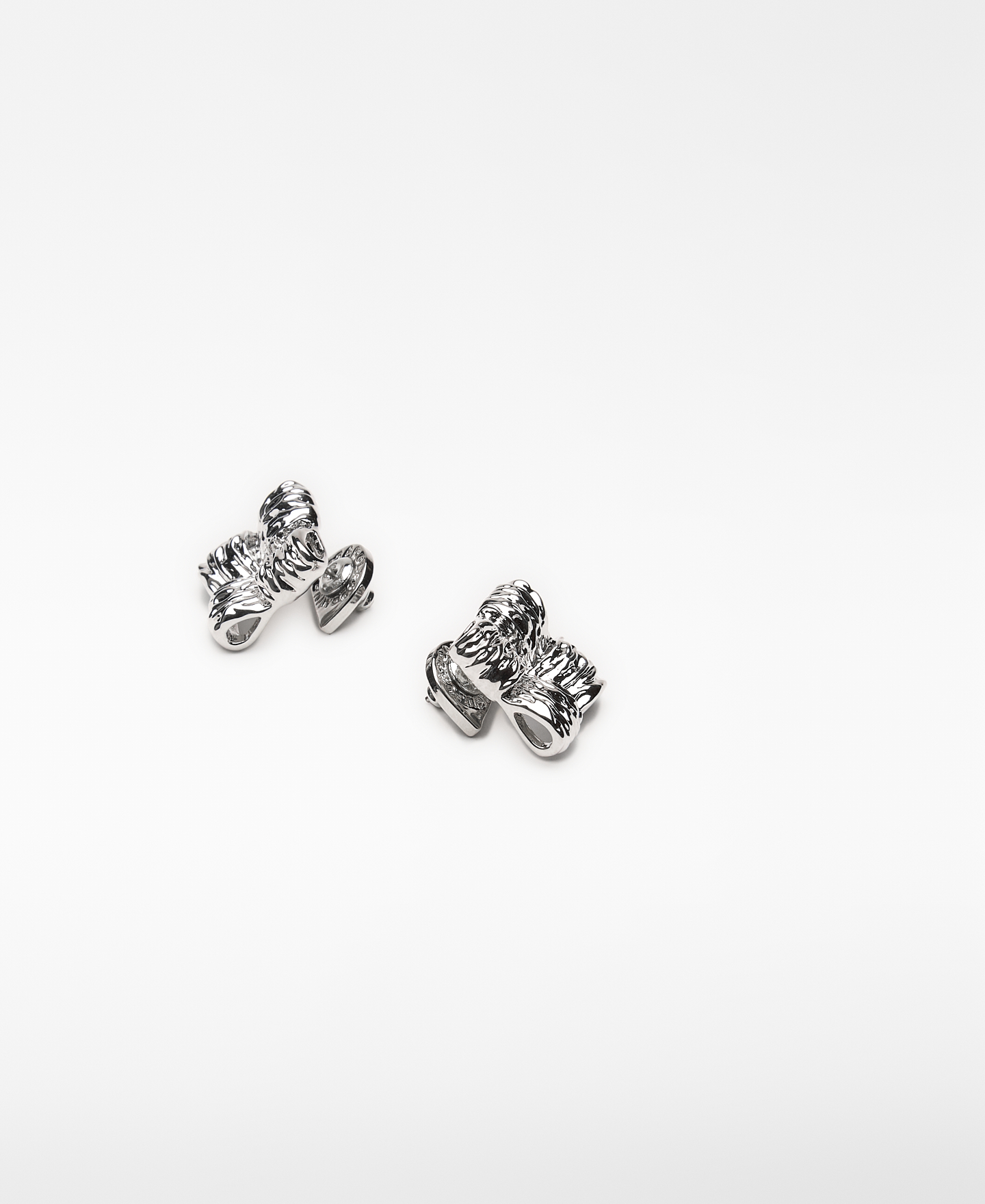 Zinc bow motif earring woman image number 1