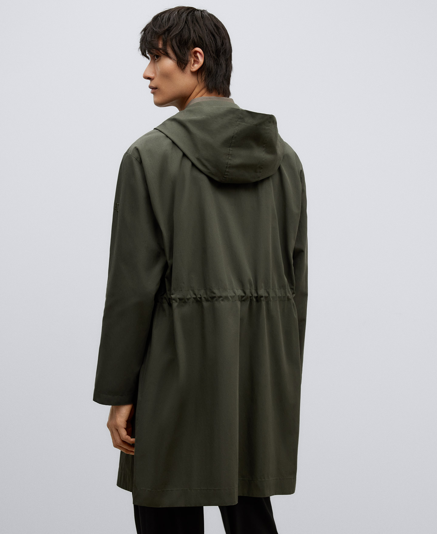 Green hooded trench man image number 2
