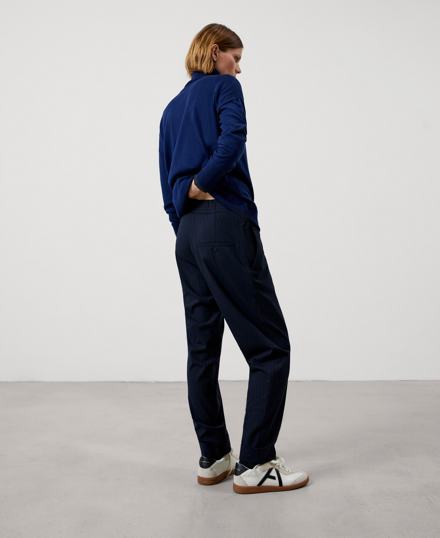 Asymmetric straight trousers image number 2