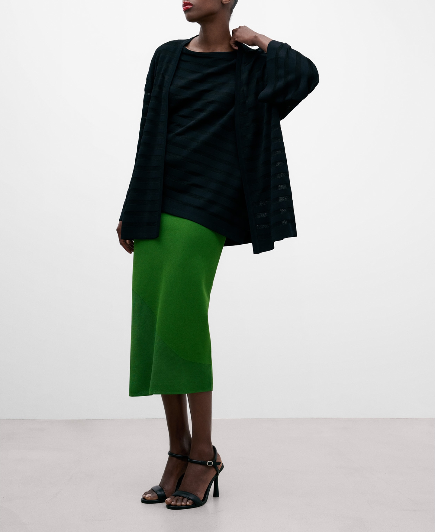 Semitransparent knitted black jacket image number 1