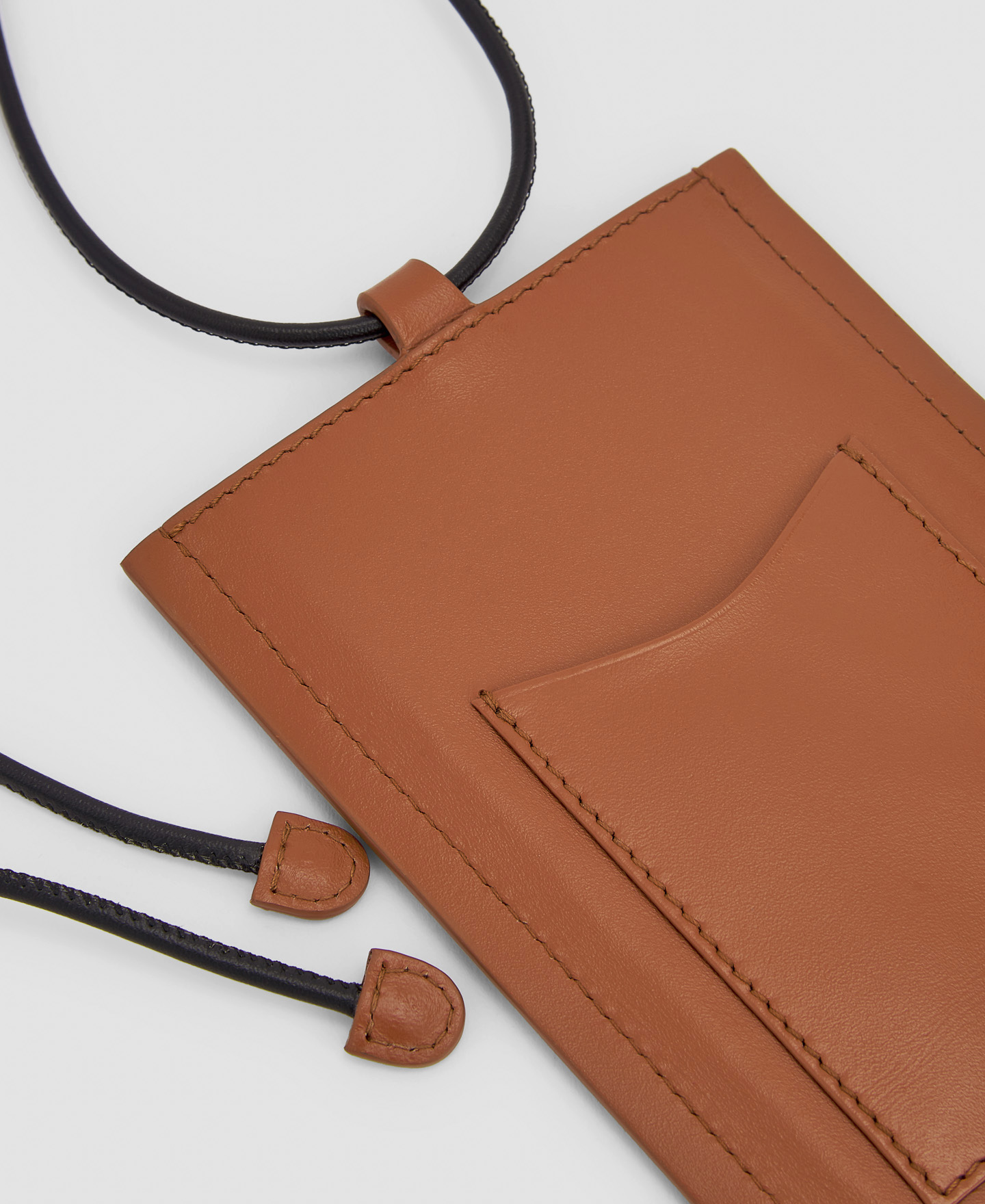 Mobile phone holder with adjustable cord image number 2